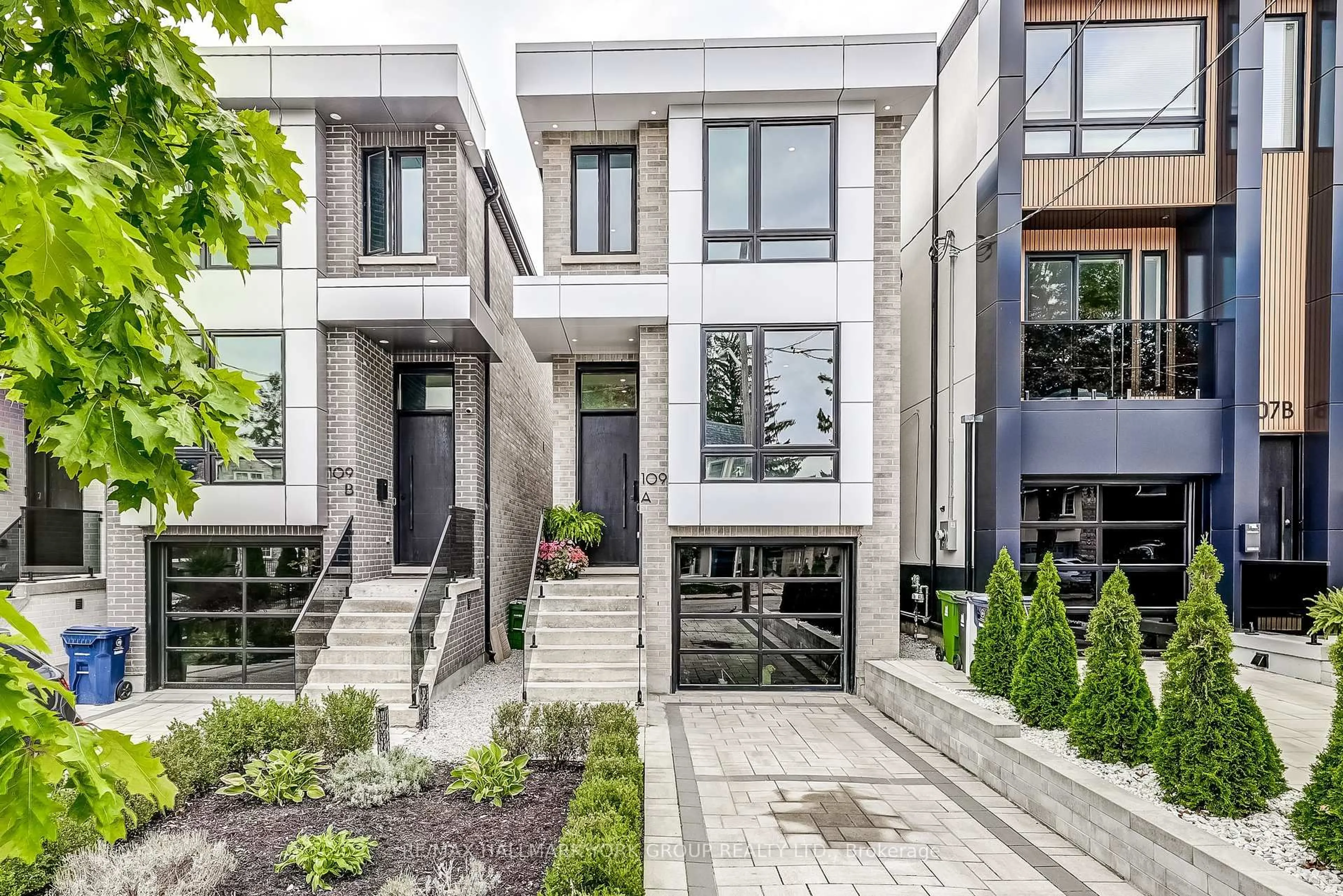 Home with brick exterior material, street for 109A Holborne Ave, Toronto Ontario M4C 2R3