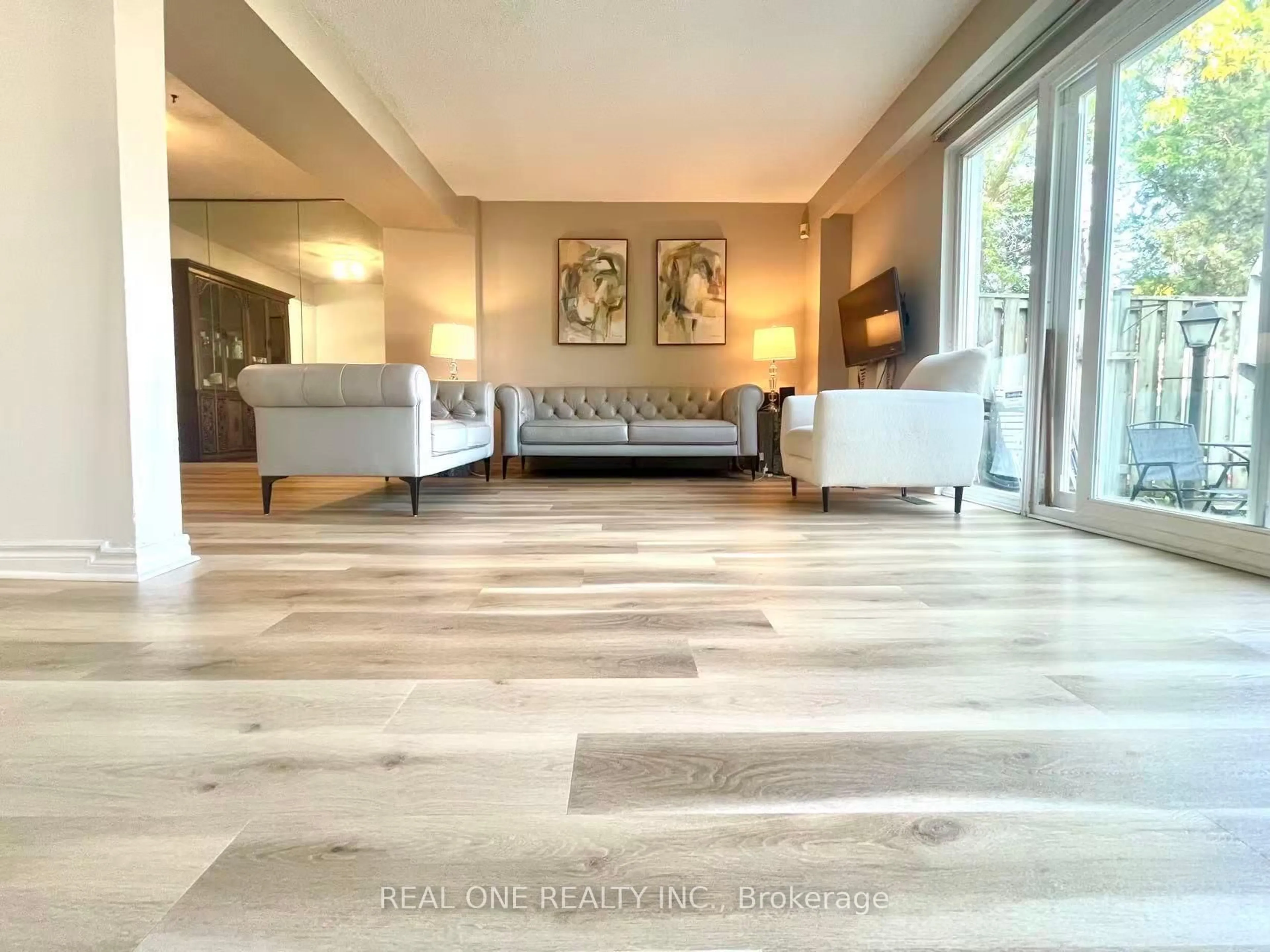 Living room with furniture, wood/laminate floor for 54 Bonis Ave, Toronto Ontario M1T 2V1