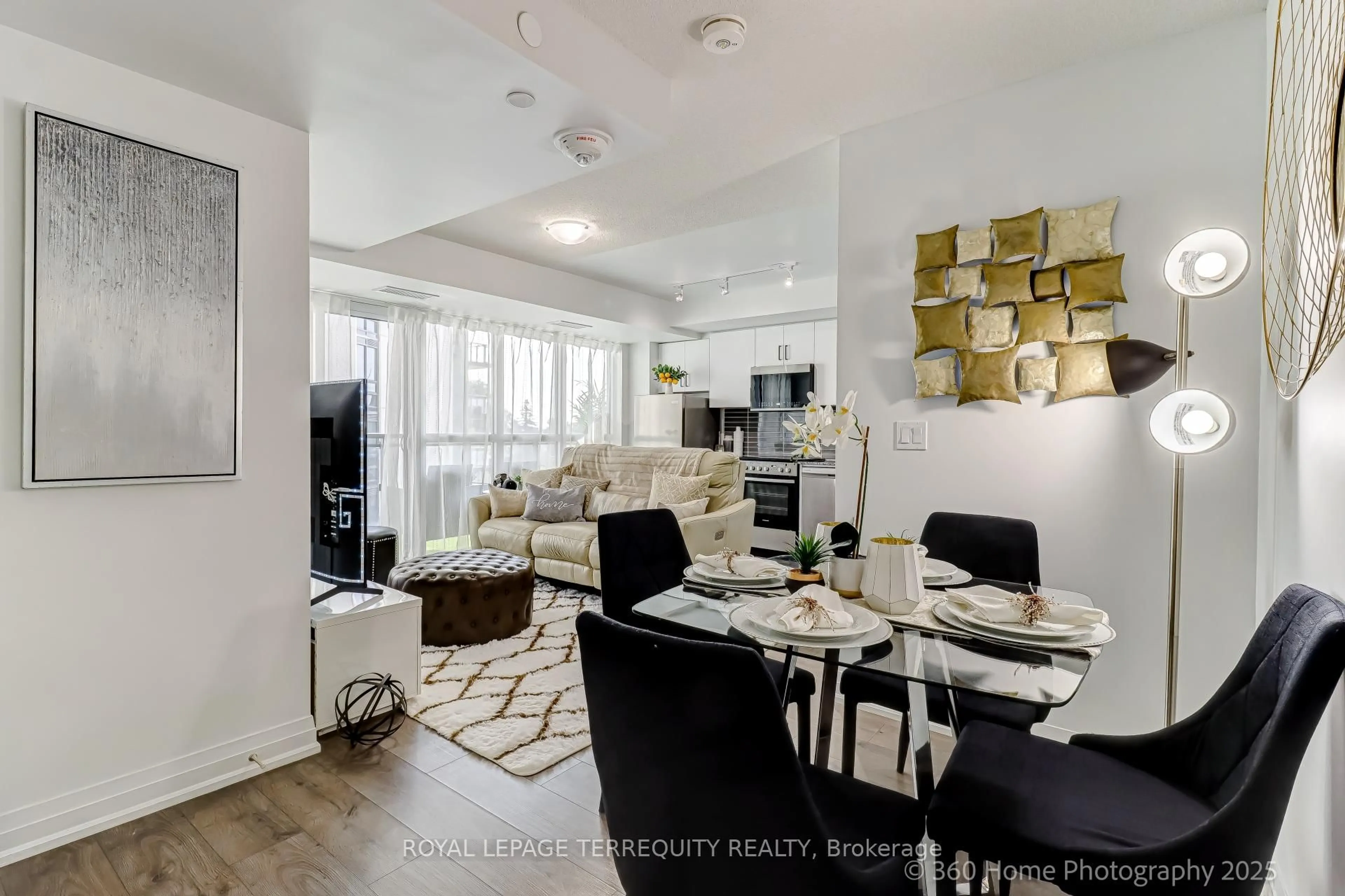 Living room with furniture, unknown for 20 Meadowglen Pl #326, Toronto Ontario M1G 0A9