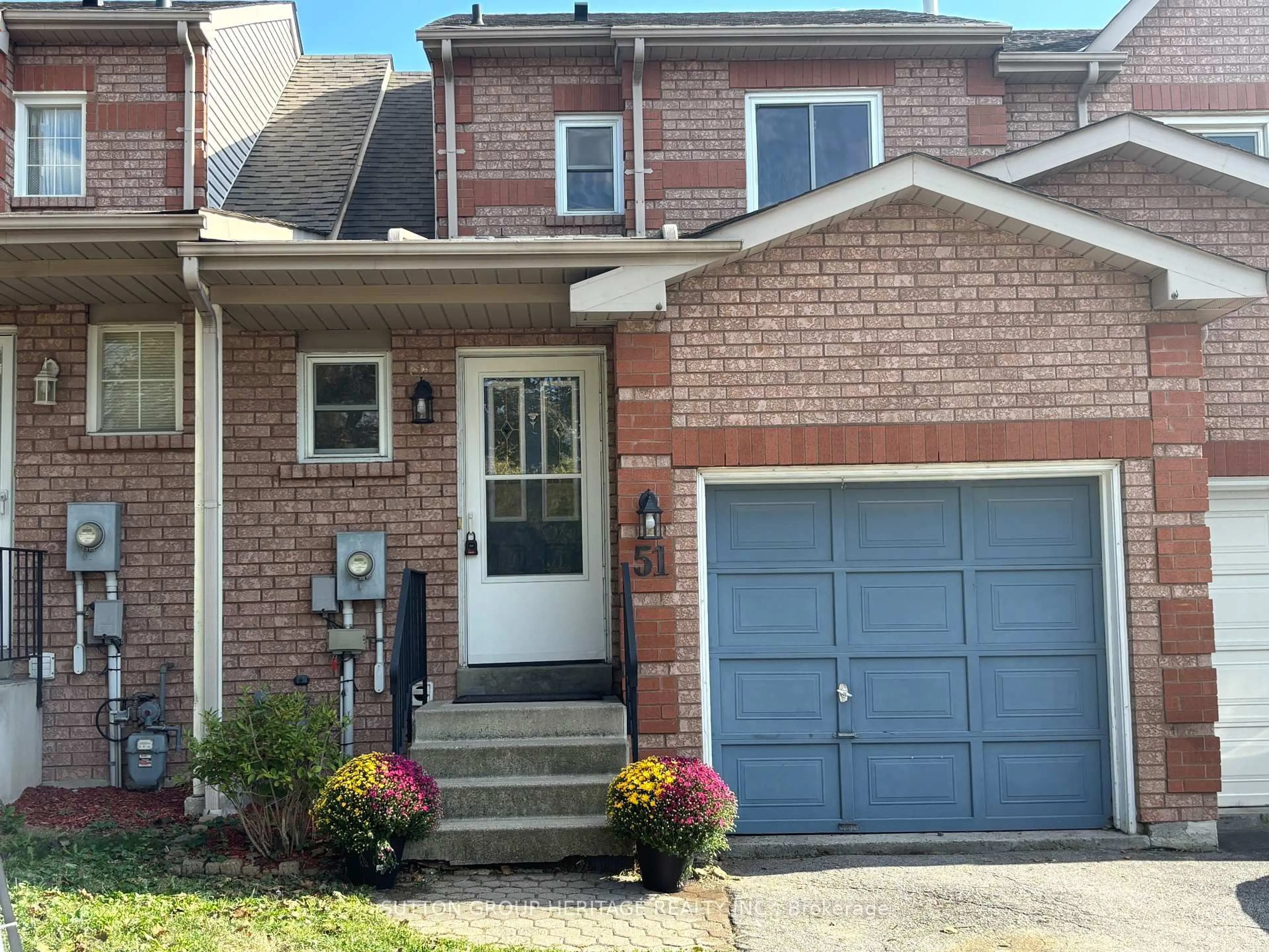 Home with brick exterior material, street for 51 Wallace Dr, Whitby Ontario L1N 9B7
