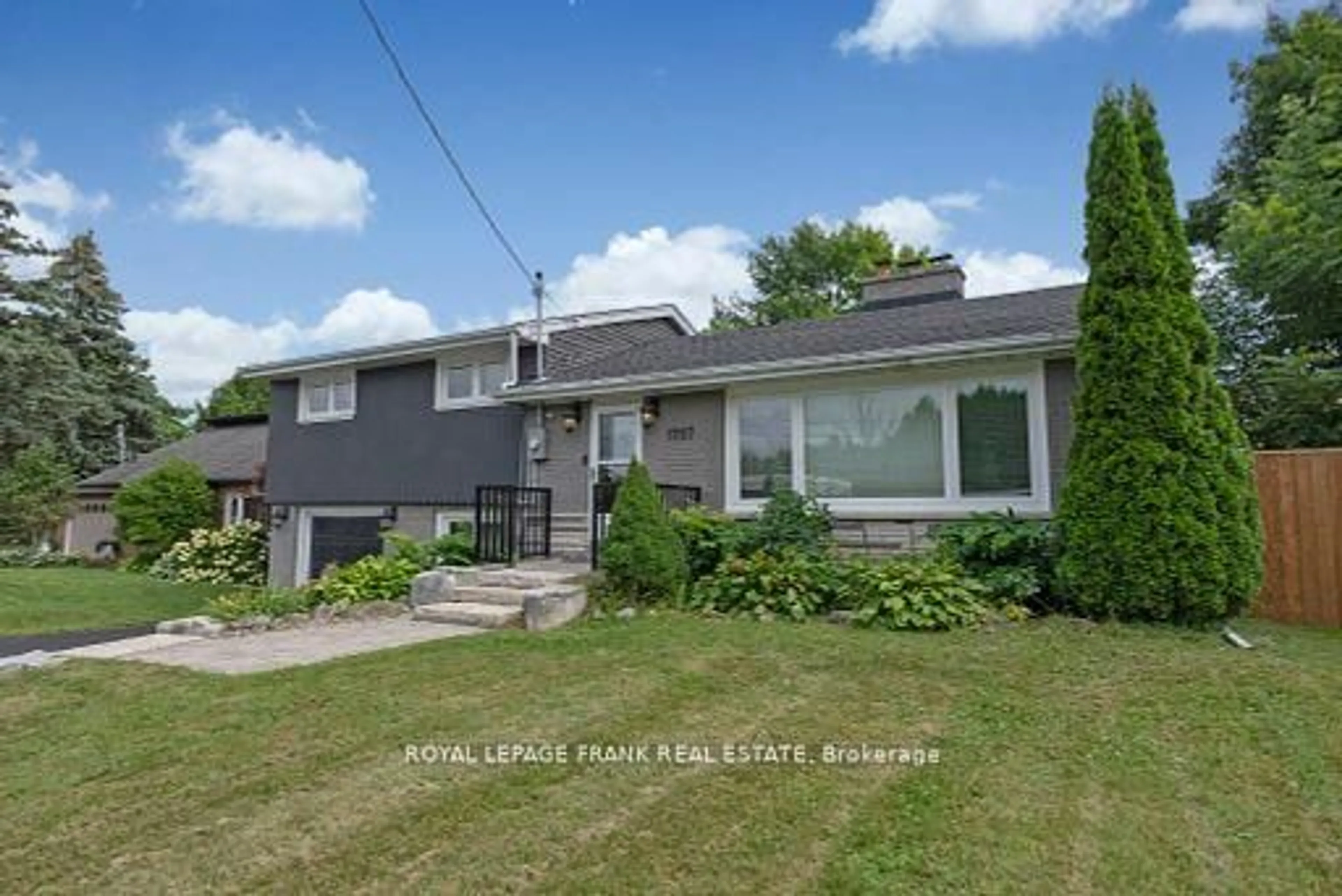 A pic from outside/outdoor area/front of a property/back of a property/a pic from drone, street for 1707 Highway 2 Rd, Clarington Ontario L1E 0A3