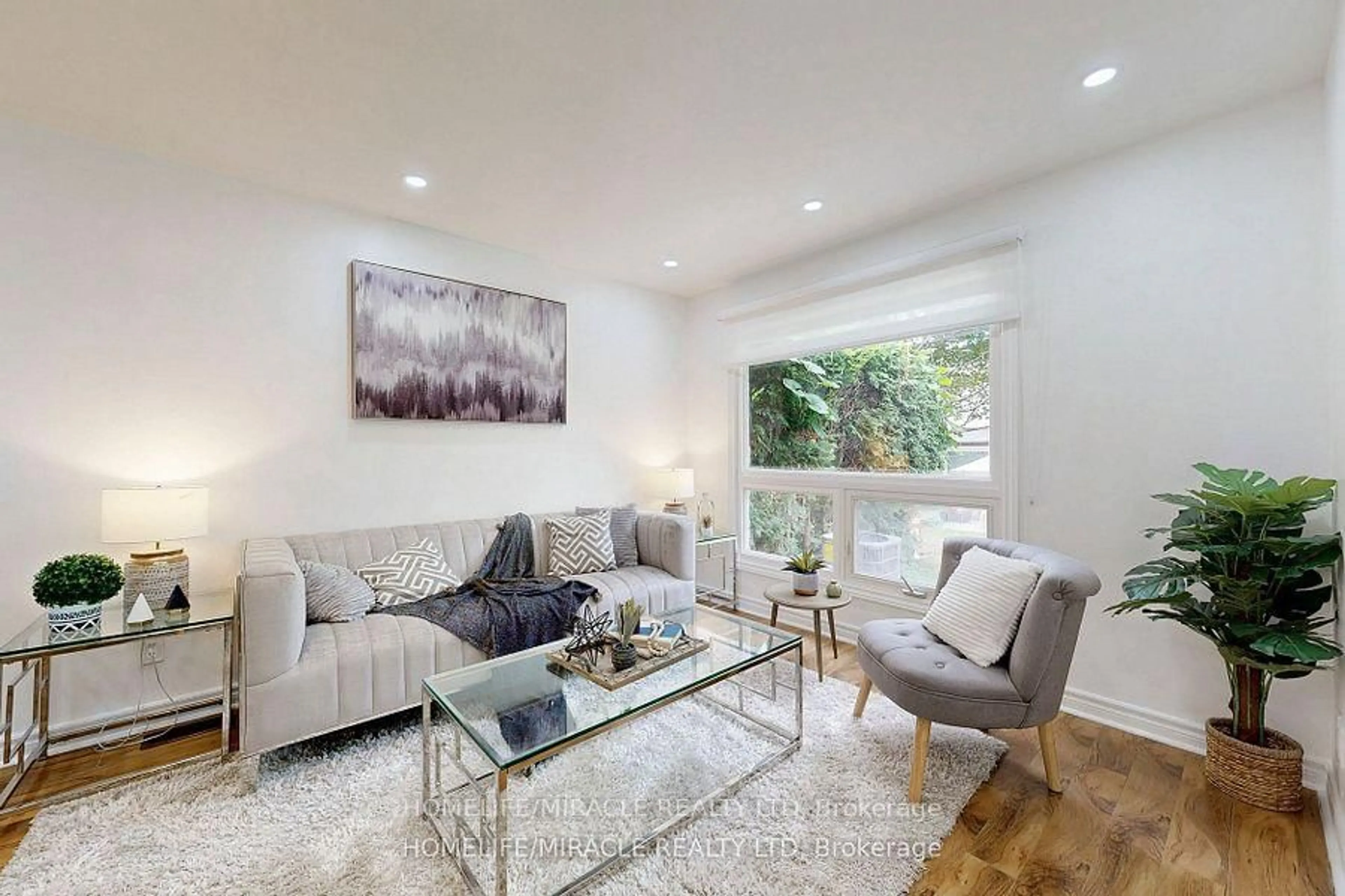 Living room with furniture, wood/laminate floor for 108 Malvern St #57, Toronto Ontario M1B 2V4