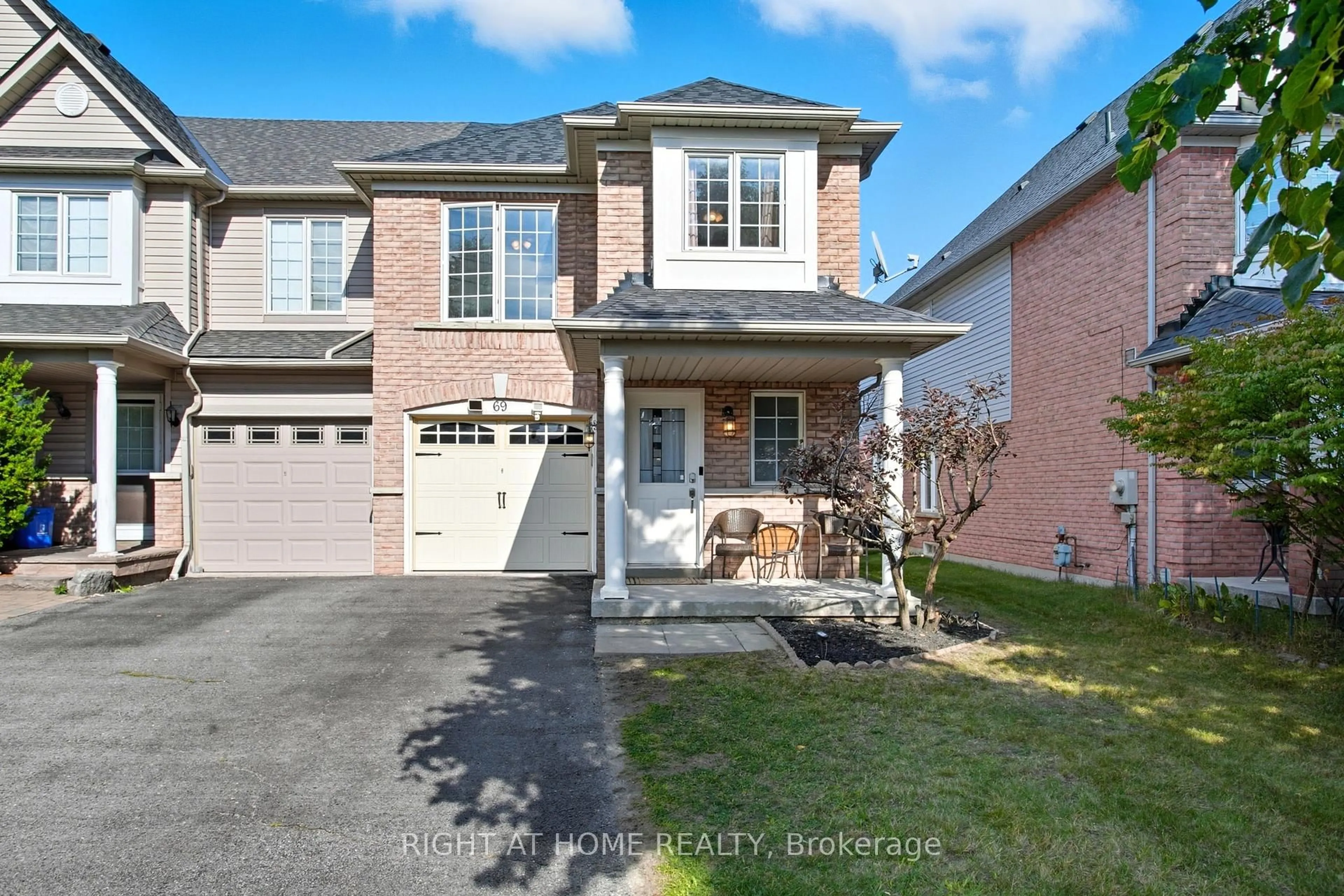 Home with brick exterior material, street for 69 Cathedral Dr, Whitby Ontario L1R 3N9