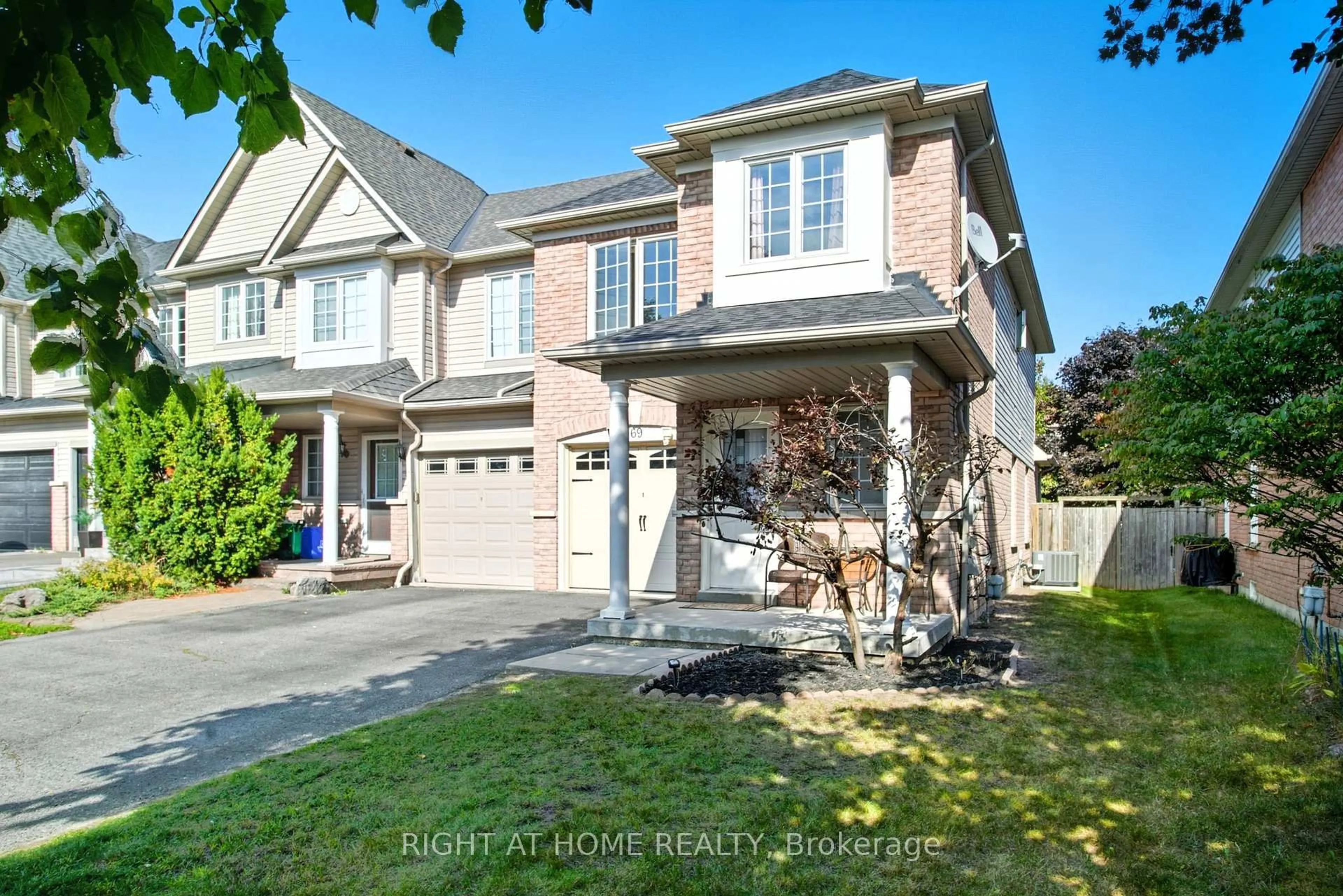 Home with brick exterior material, street for 69 Cathedral Dr, Whitby Ontario L1R 3N9