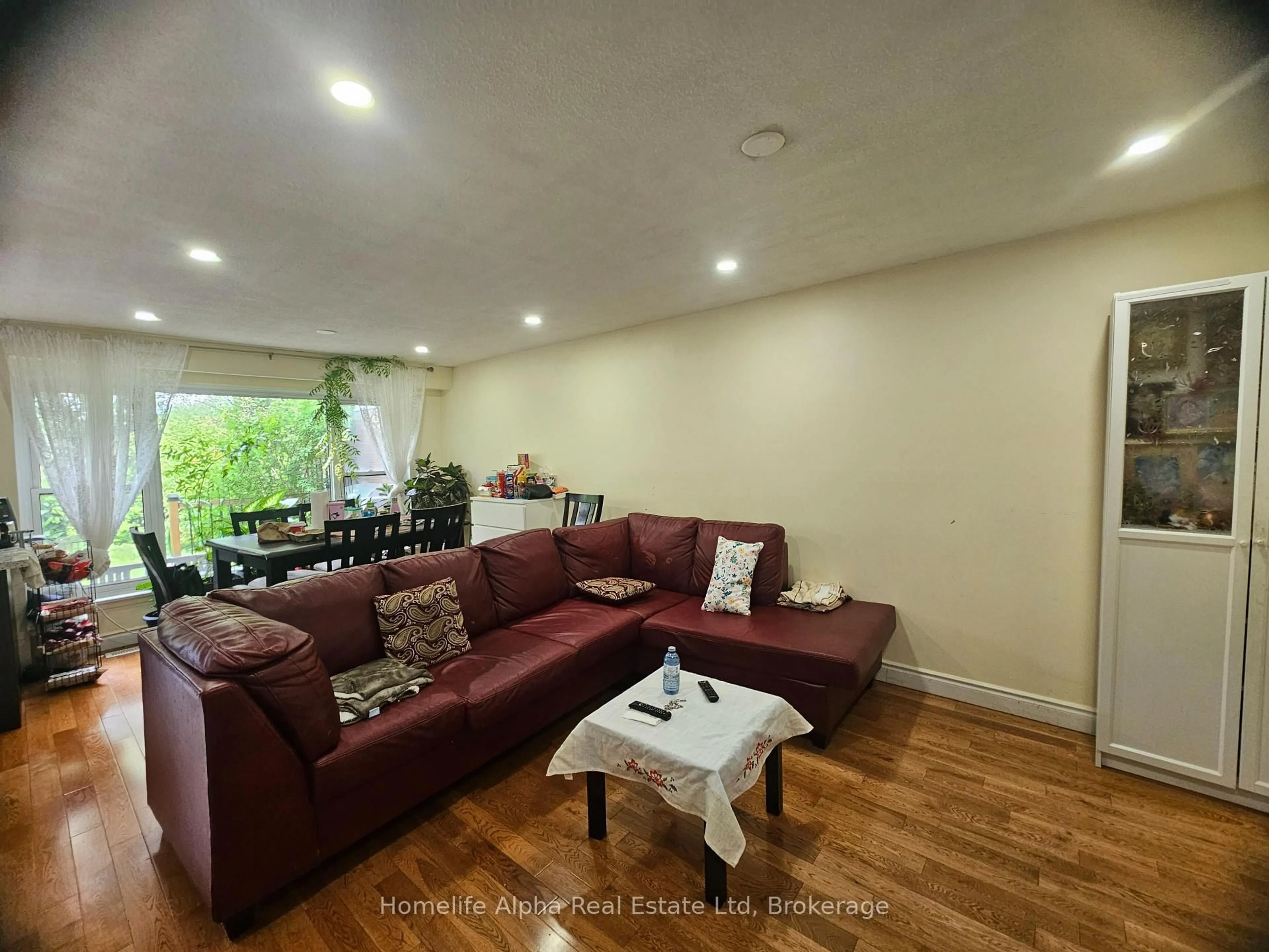 Living room with furniture, unknown for 3003 Bridletowne Circ, Toronto Ontario M1W 2C9