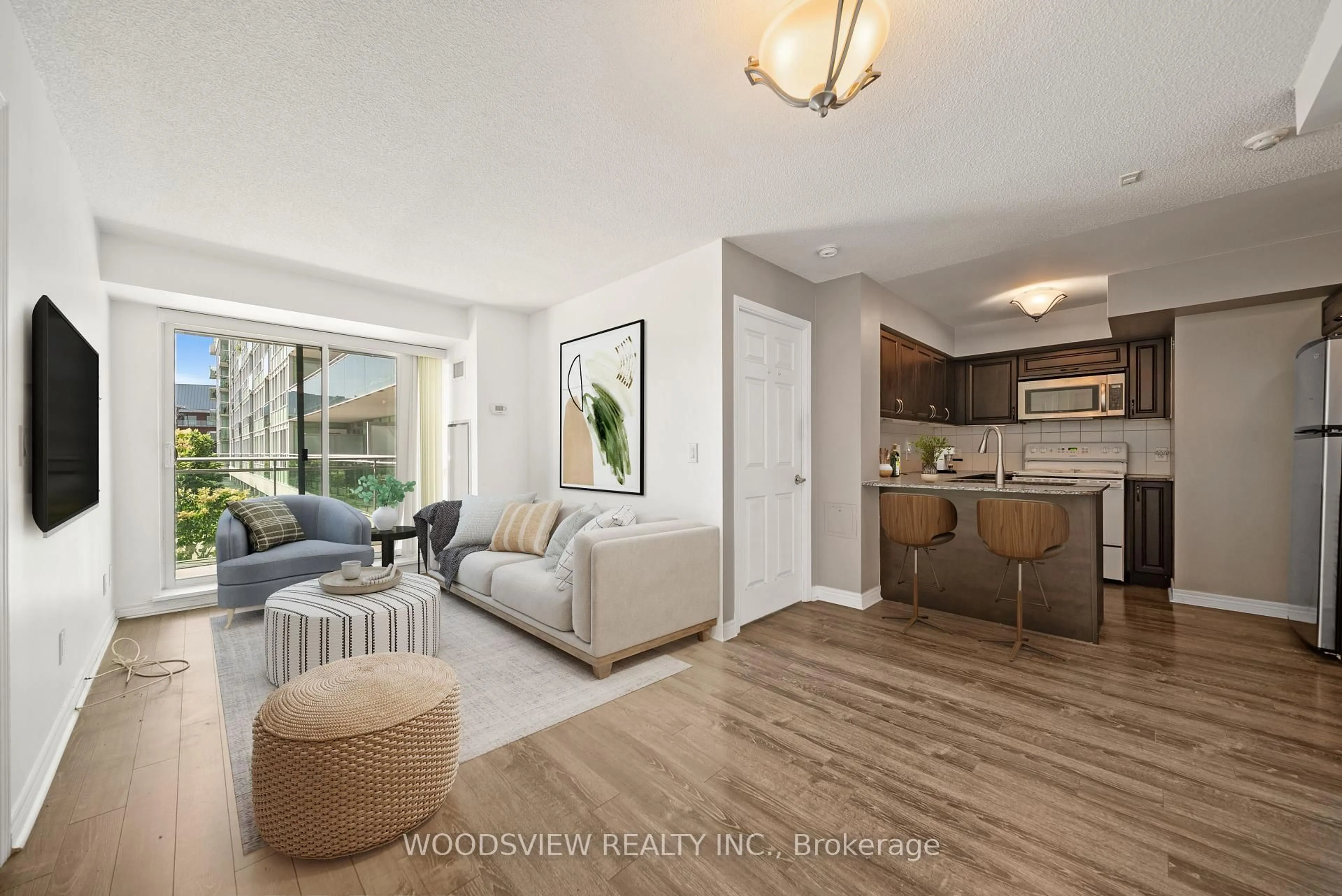 Living room with furniture, unknown for 60 Fairfax Cres #233, Toronto Ontario M1L 1Z8