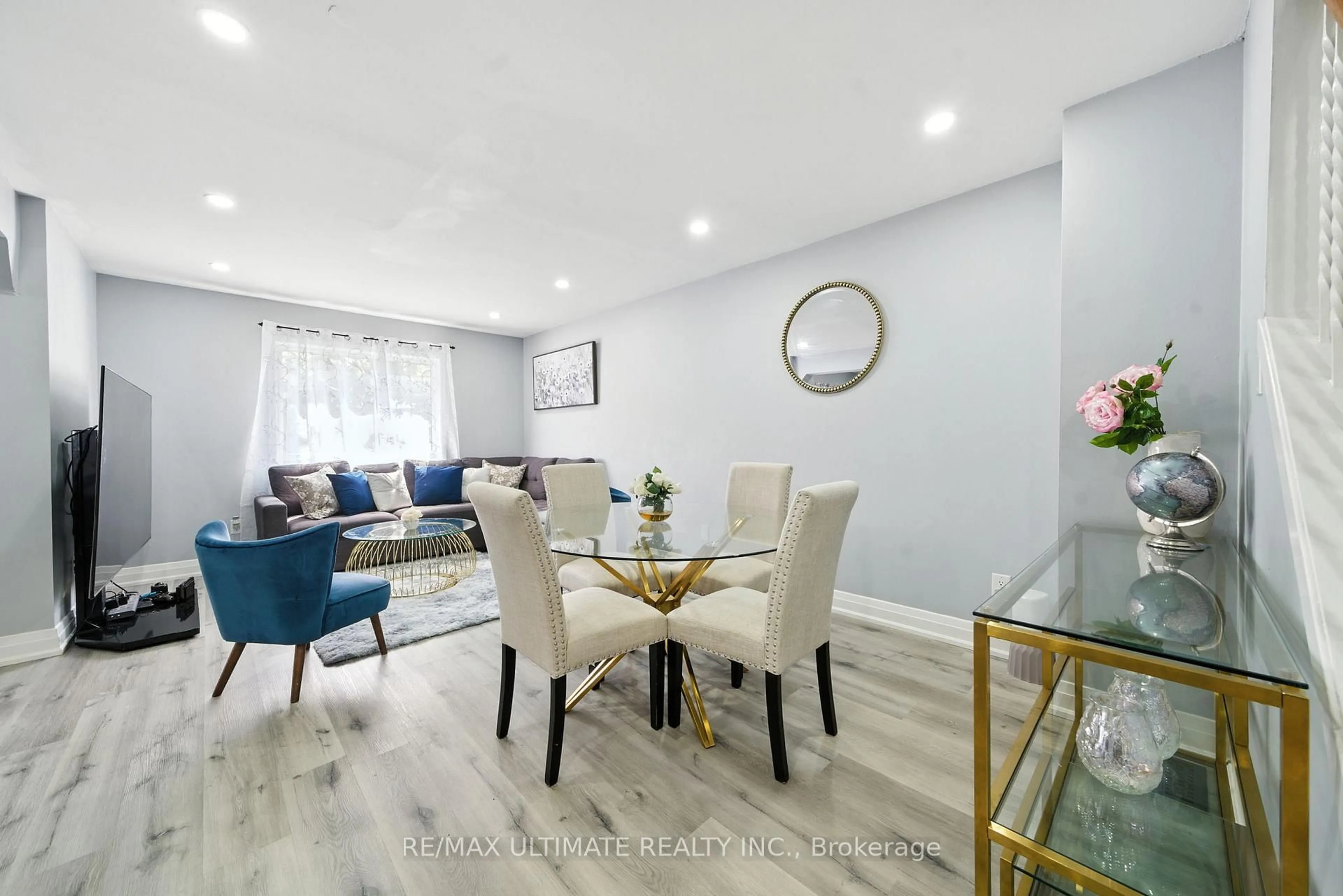 Living room with furniture, wood/laminate floor for 1553 Geta Circ, Pickering Ontario L1V 3B5