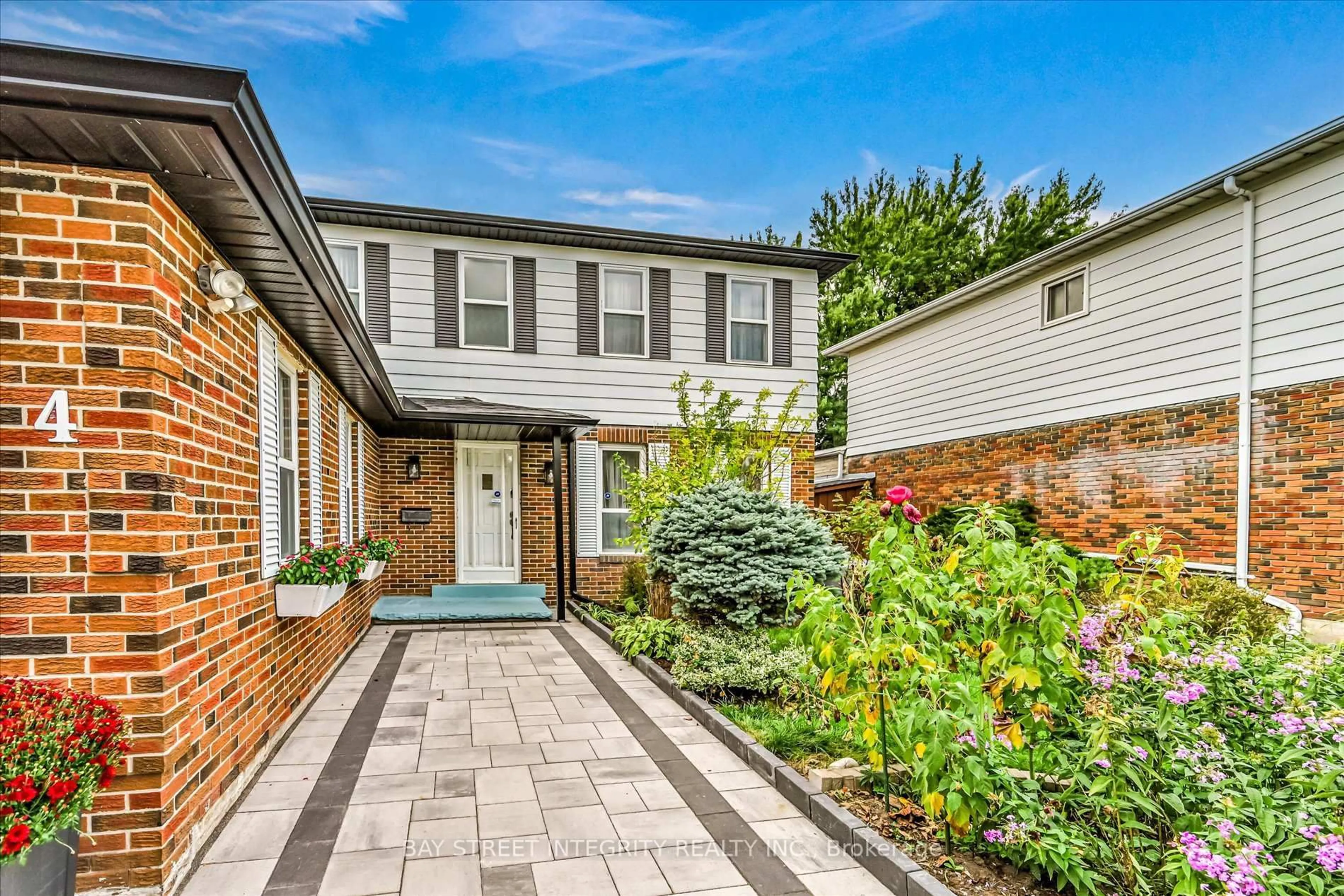 Home with brick exterior material, street for 4 Harfleur Rd, Toronto Ontario M1T 2X5