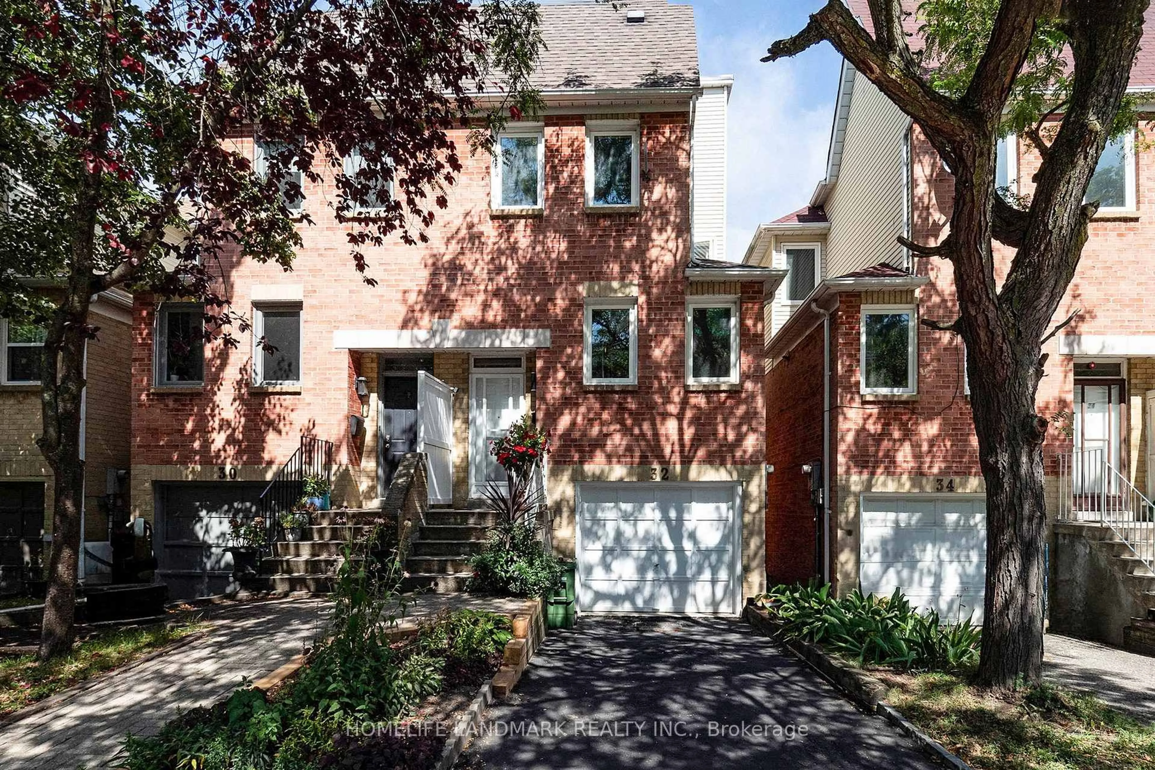 Home with brick exterior material, street for 32 Coatsworth Cres, Toronto Ontario M4C 5P5