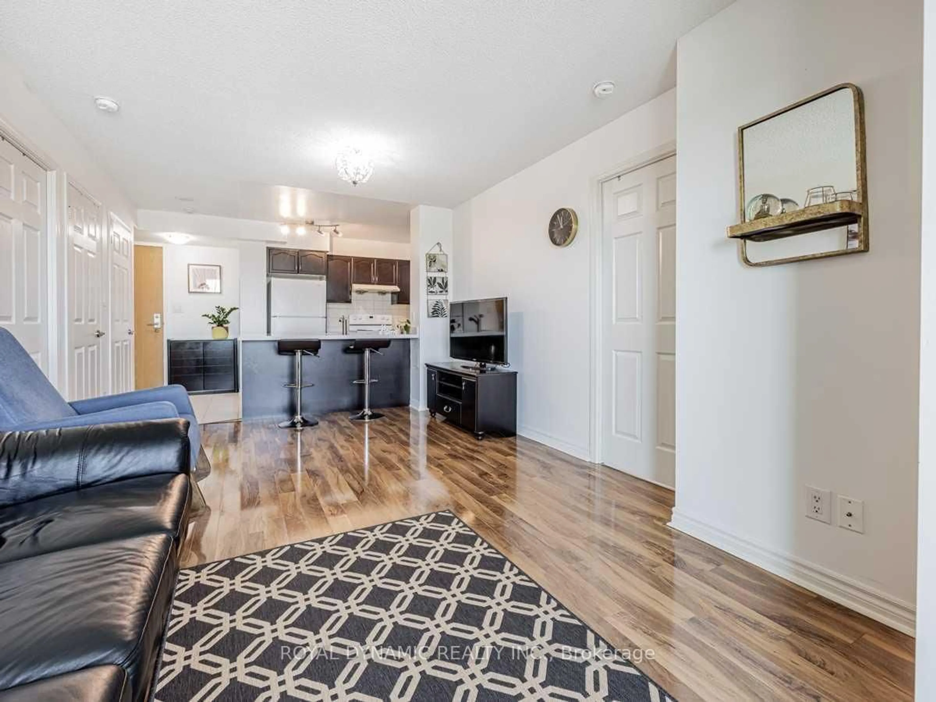 Living room with furniture, wood/laminate floor for 88 Grangeway Ave #2007, Toronto Ontario M1H 0A2