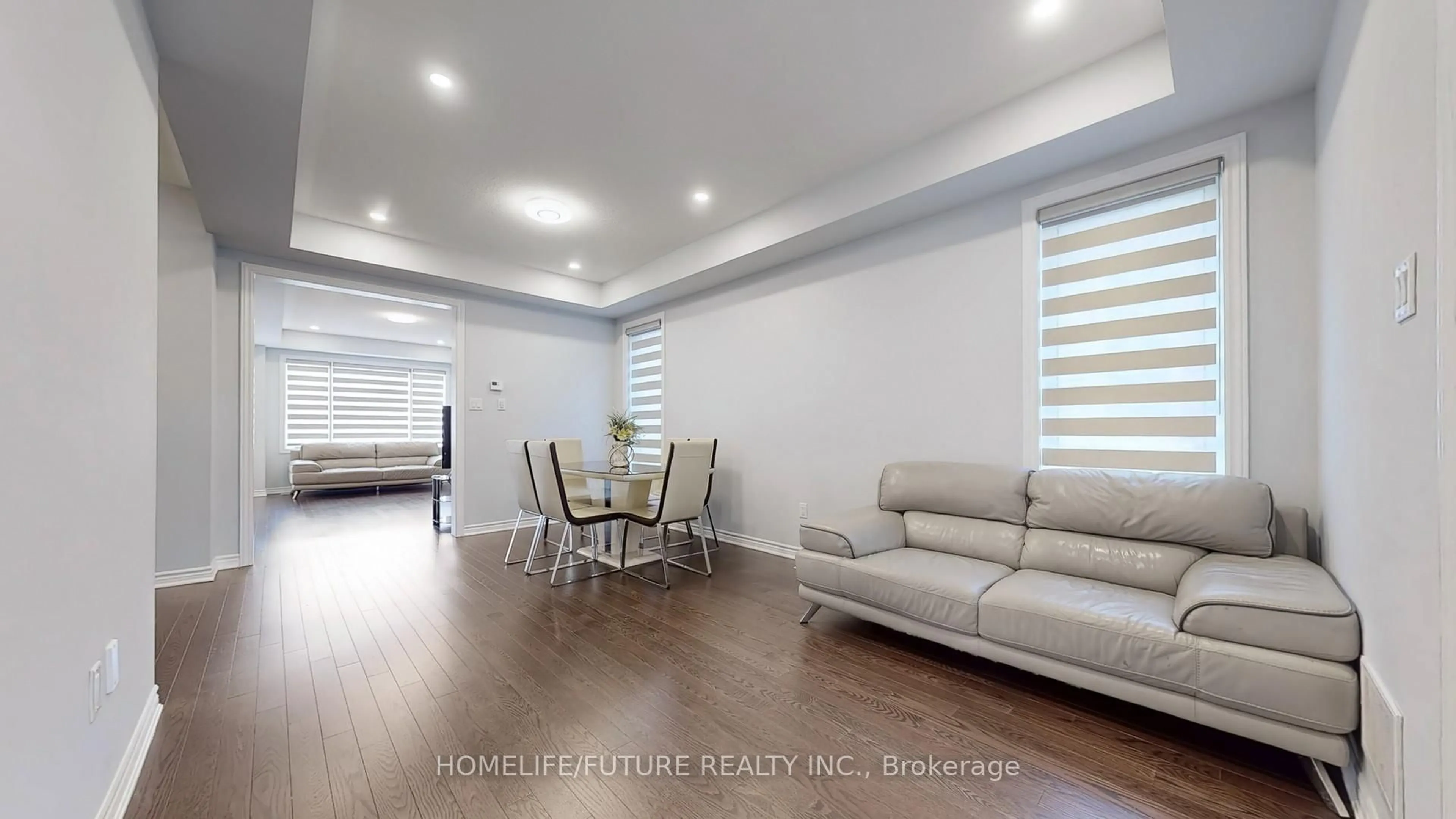 Living room with furniture, wood/laminate floor for 99 Southampton St, Scugog Ontario L9L 2E5