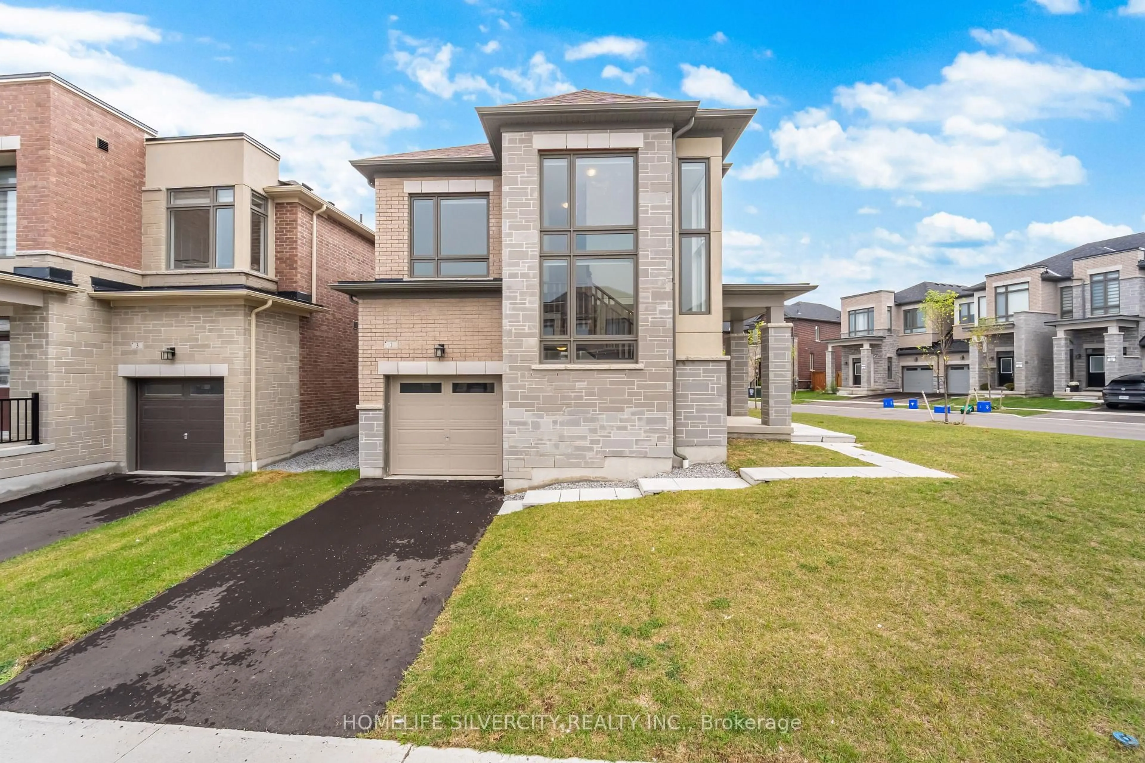 Home with brick exterior material, street for 1 Armilia Pl, Whitby Ontario L1P 0N9