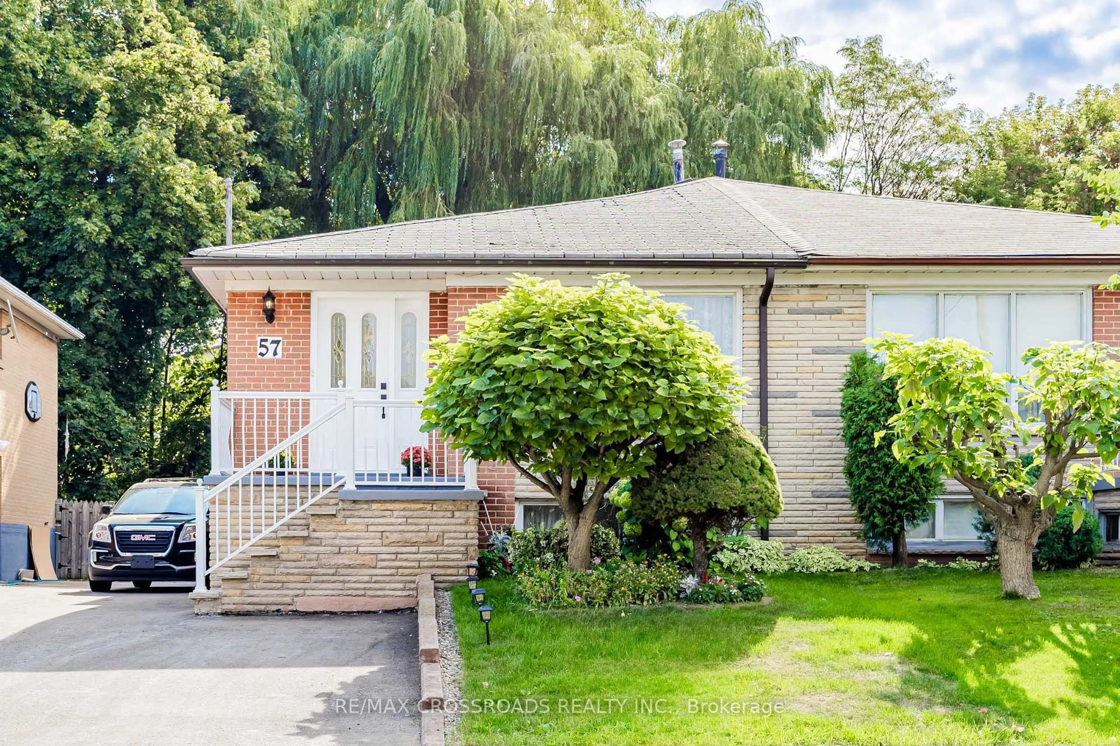 Home with brick exterior material, street for 57 Allanford Rd, Toronto Ontario M1T 2N3