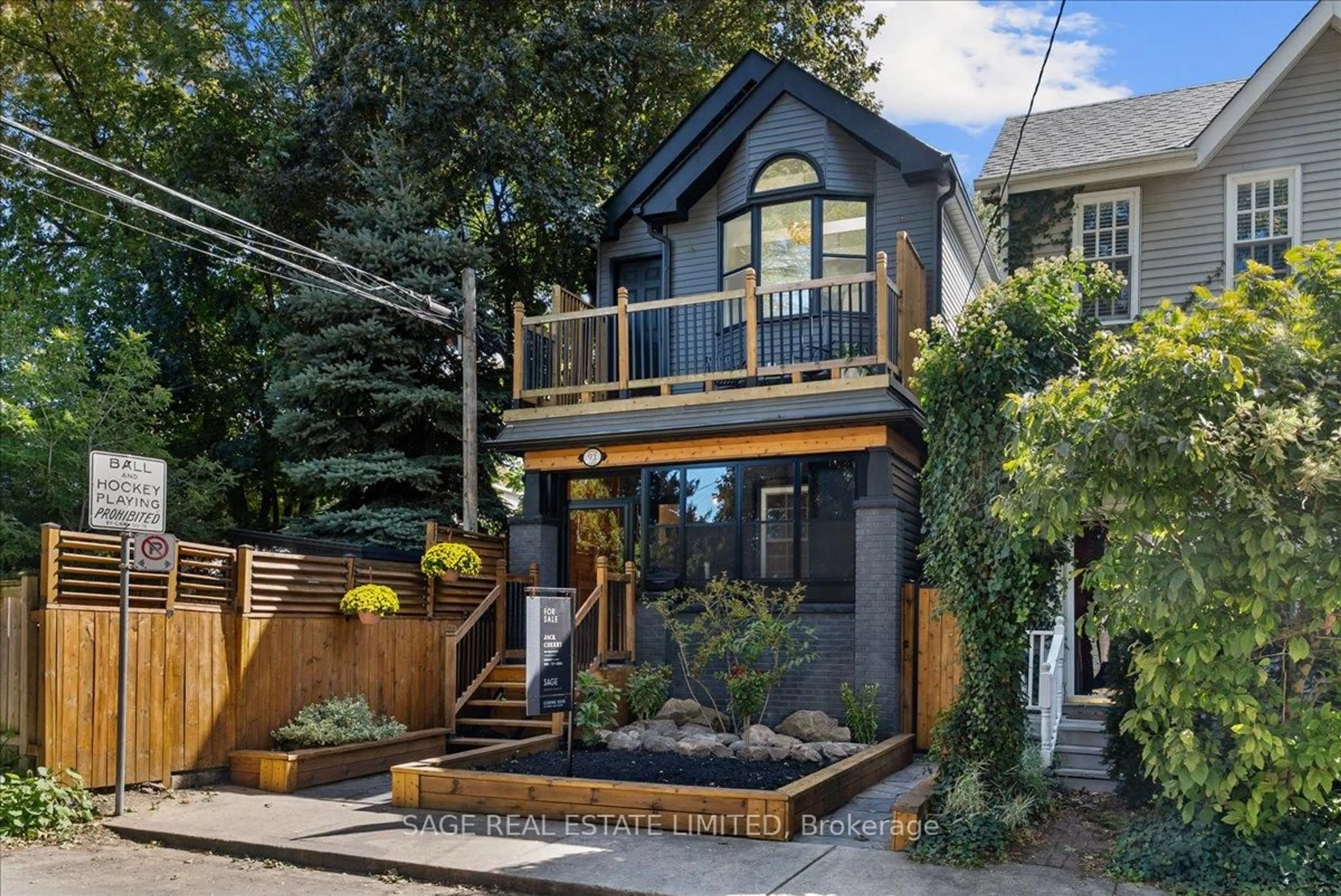 Home with brick exterior material, street for 93 Woodrow Ave, Toronto Ontario M4C 1G8