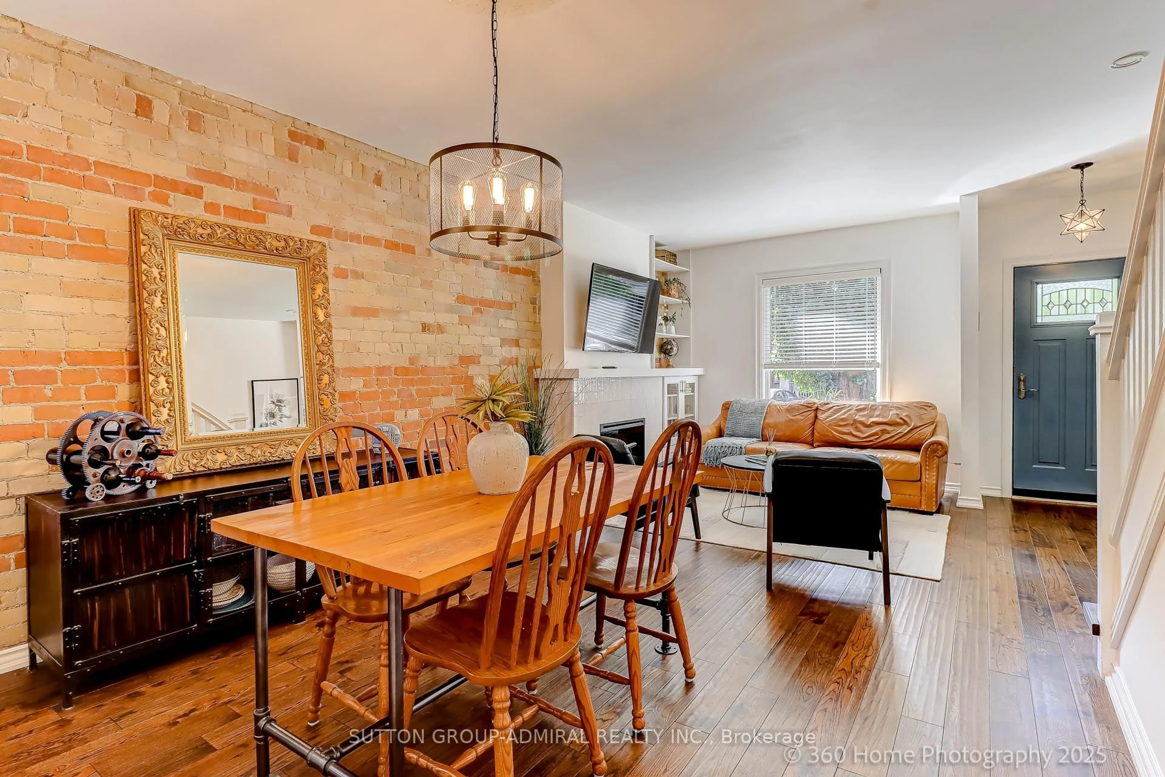 Dining room, wood/laminate floor for 93 Coady Ave, Toronto Ontario M4M 2Y9
