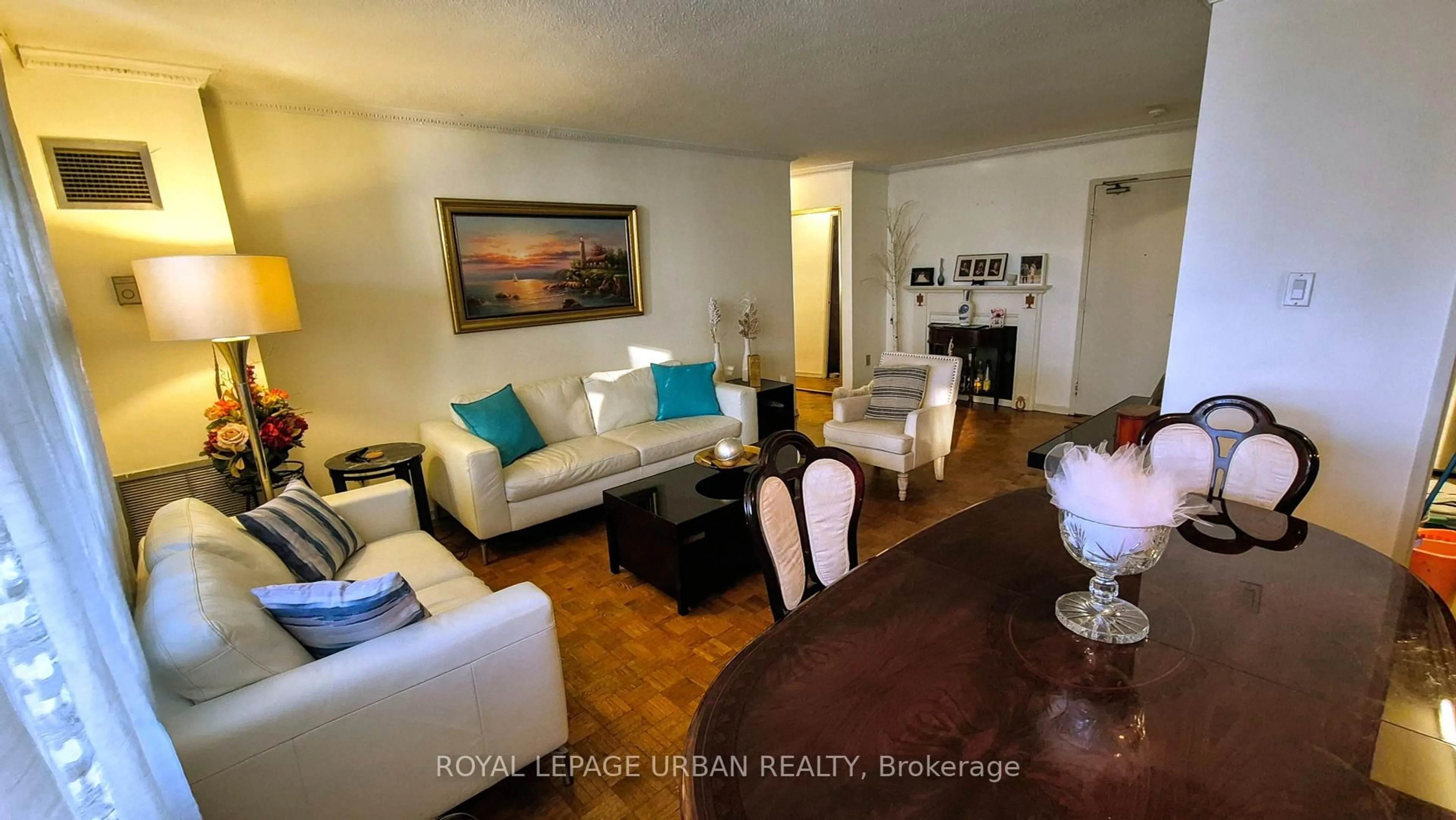 Living room with furniture, wood/laminate floor for 1135 Logan Ave #806, Toronto Ontario M4K 3Y2
