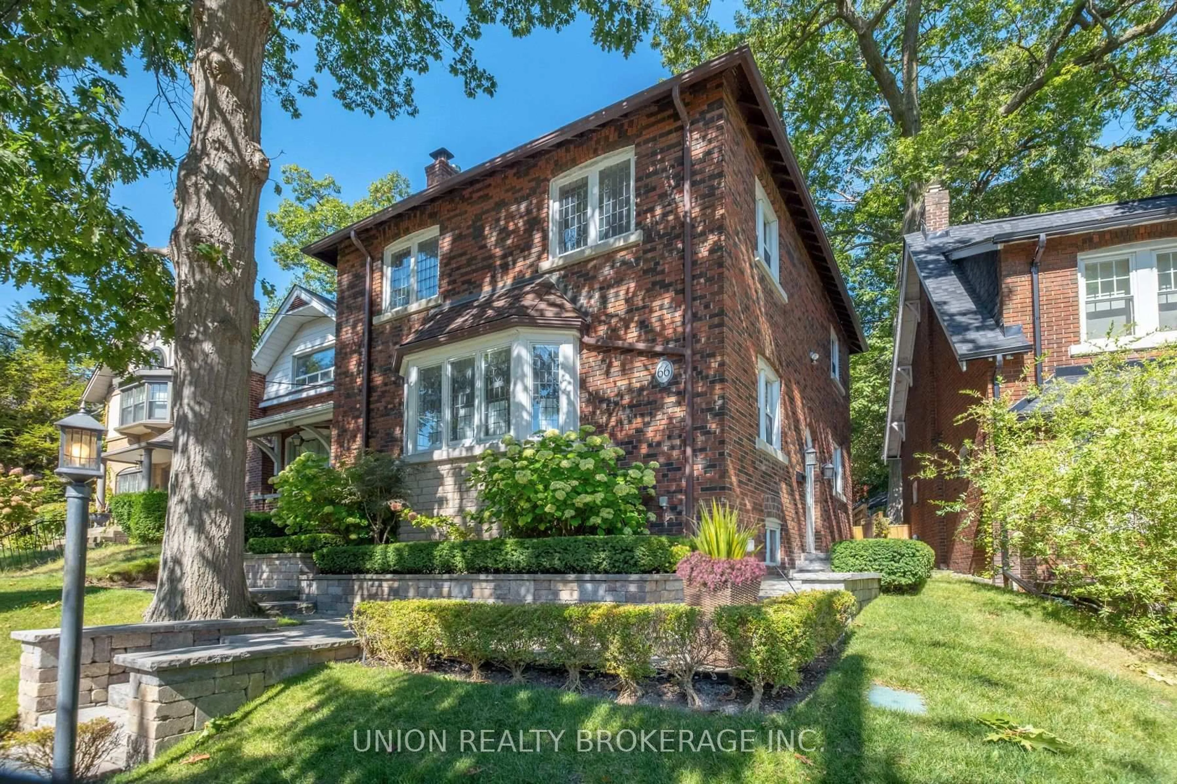 Home with brick exterior material, street for 66 Williamson Rd, Toronto Ontario M4E 1K7