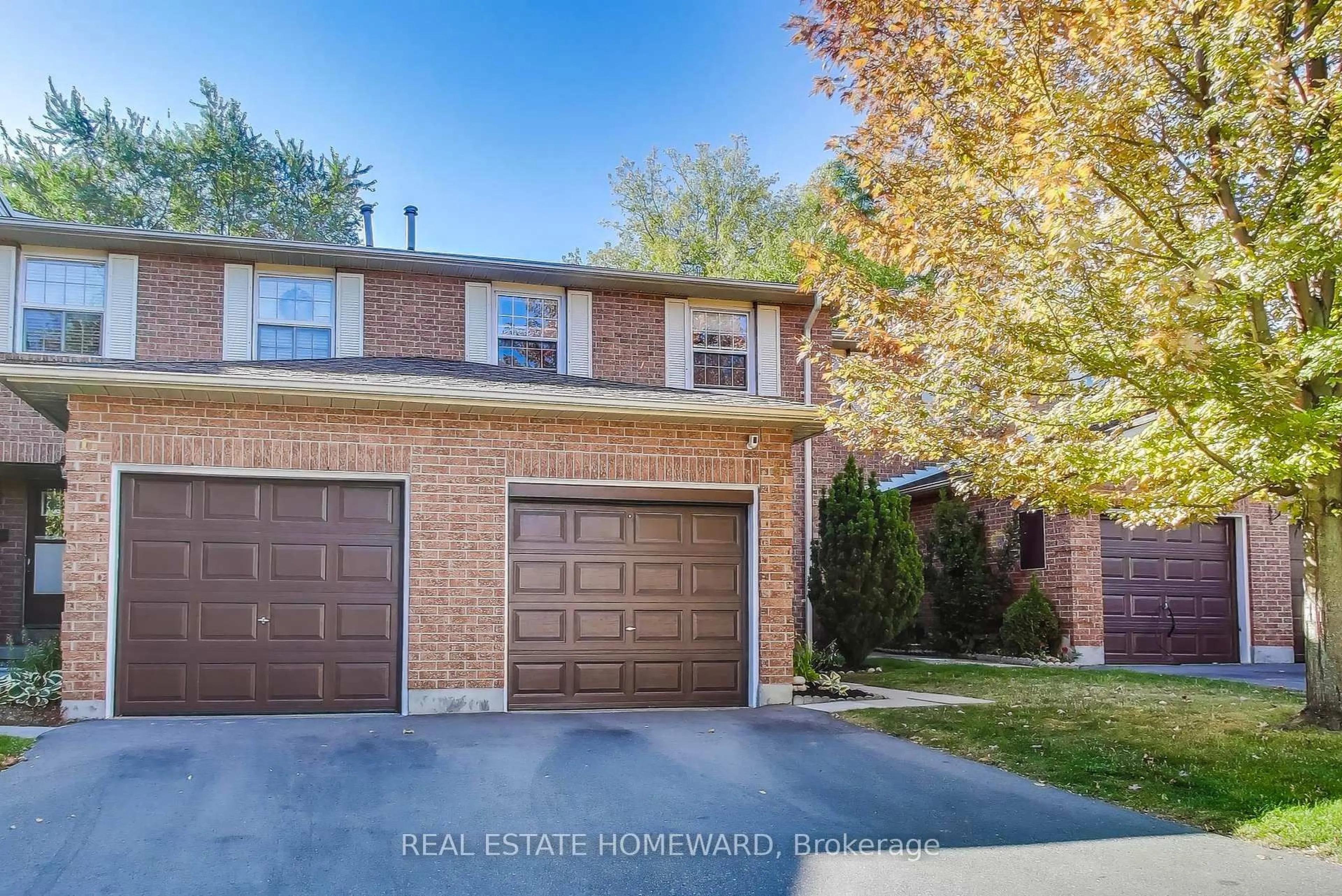Home with brick exterior material, street for 25 Whitecap Blvd #9, Toronto Ontario M1M 2Y5