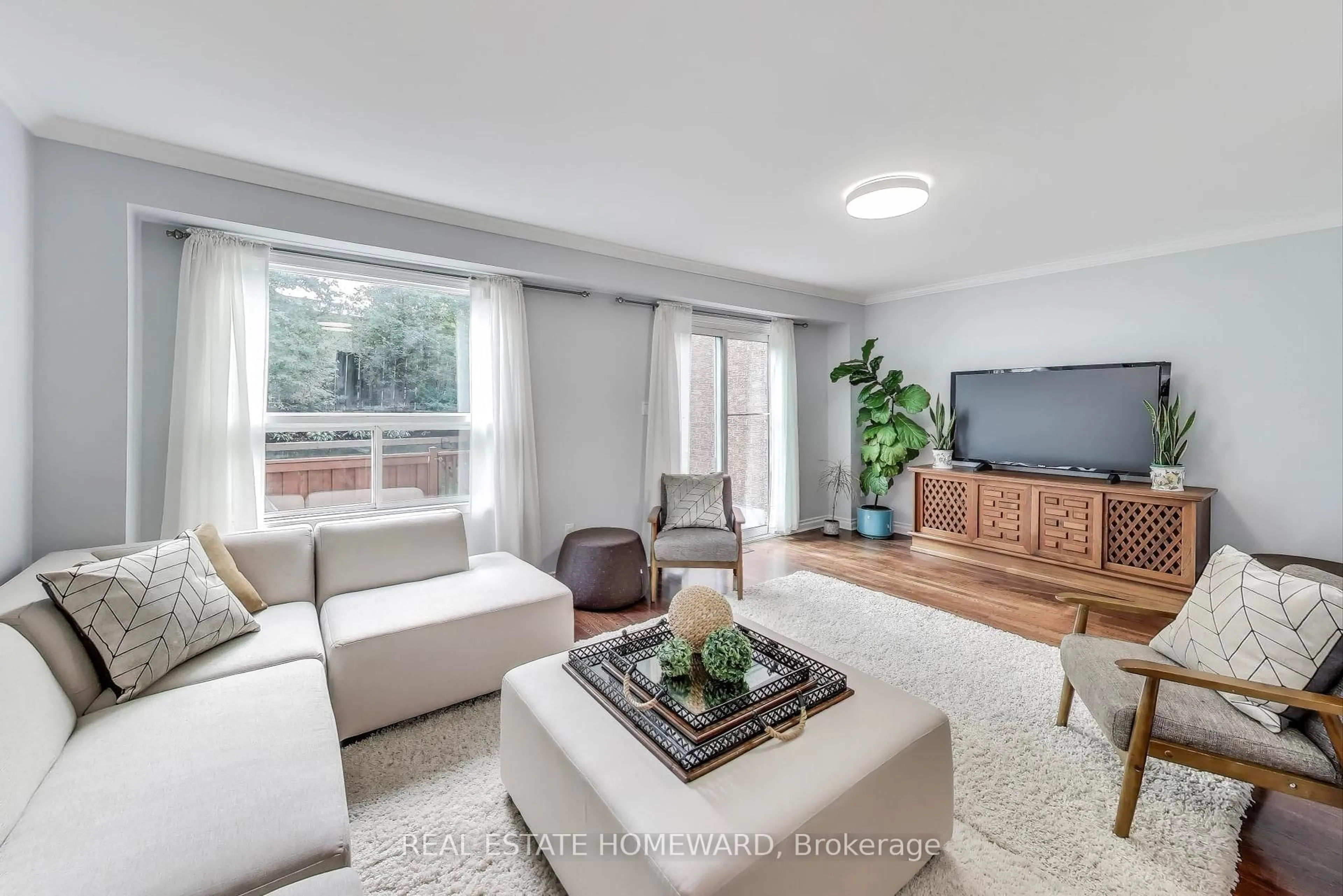Living room with furniture, unknown for 25 Whitecap Blvd #9, Toronto Ontario M1M 2Y5