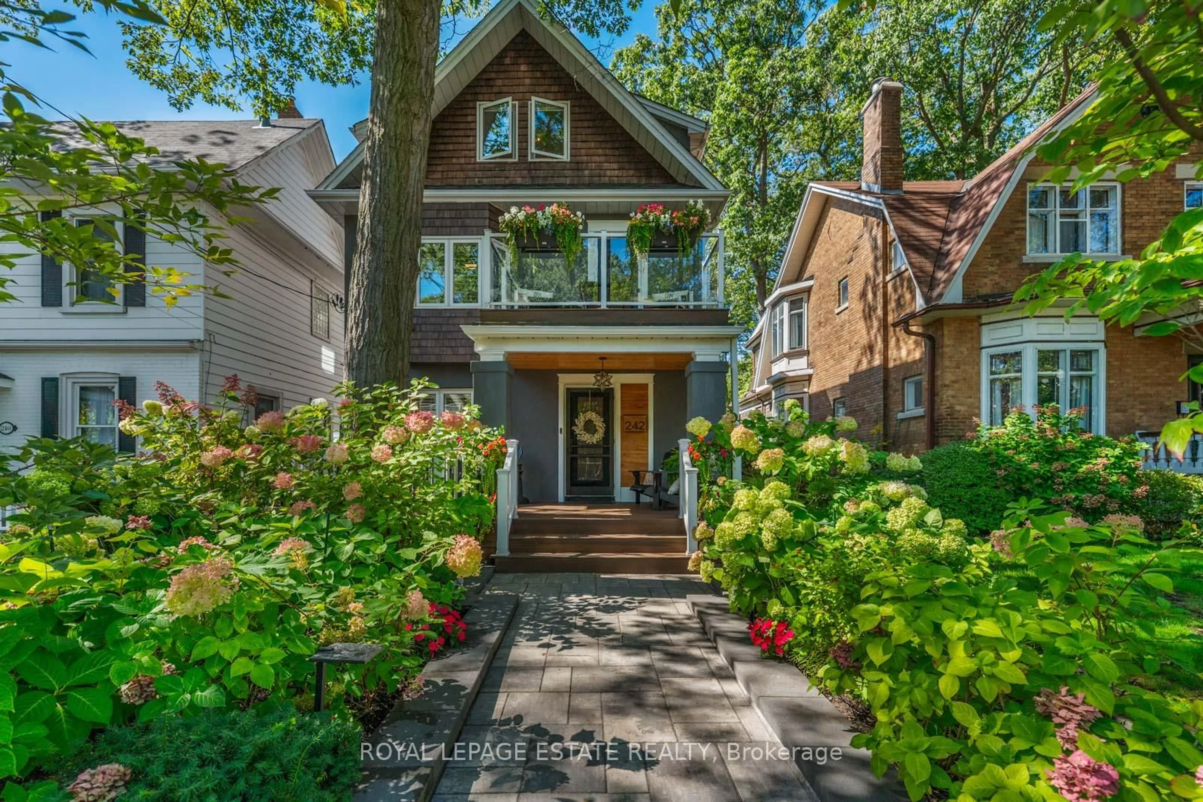 Home with brick exterior material, street for 242 Willow Ave, Toronto Ontario M4E 3K7