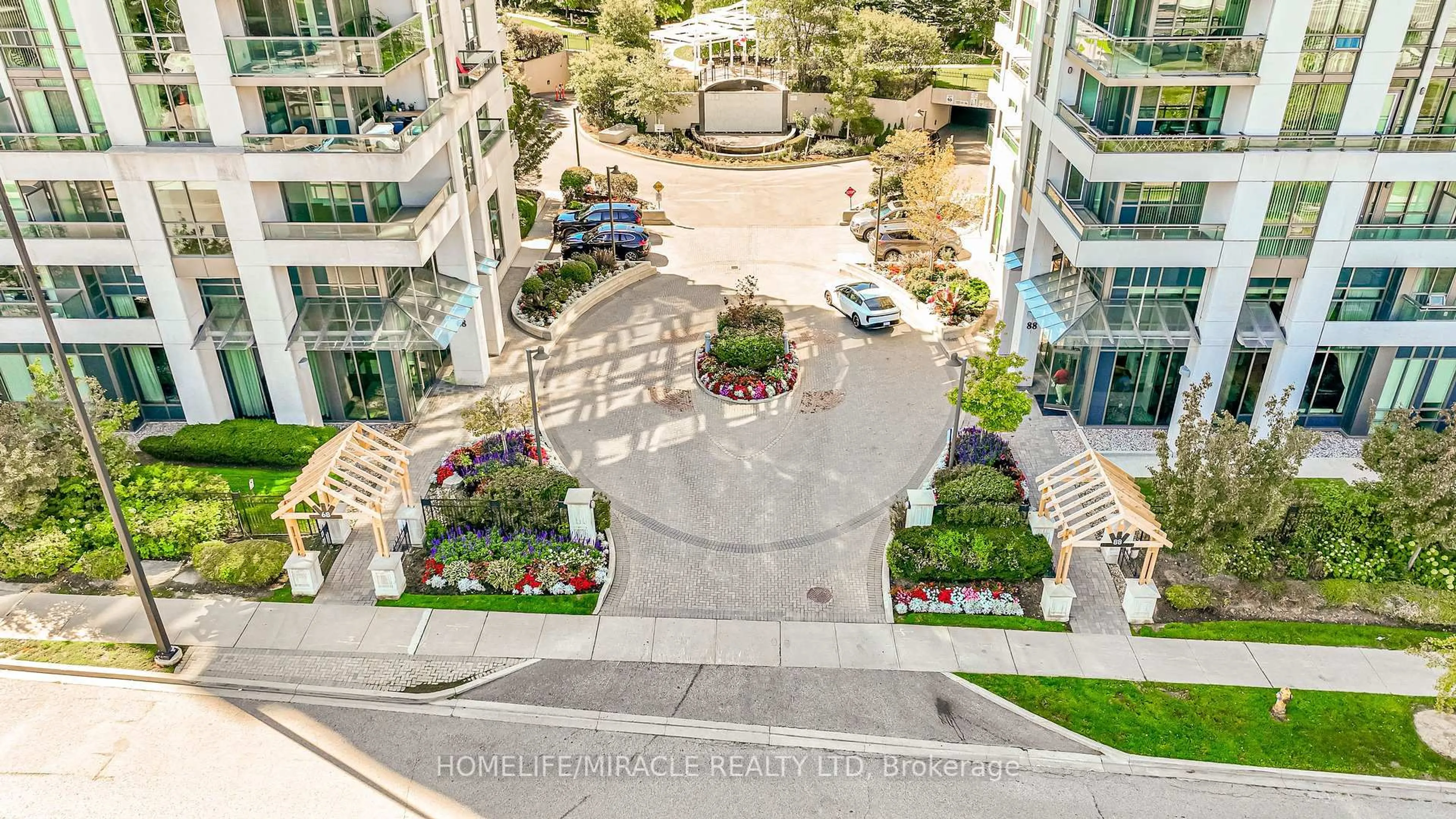 A pic from outside/outdoor area/front of a property/back of a property/a pic from drone, city buildings view from balcony for 88 Grangeway Ave #309, Toronto Ontario M1H 0A2