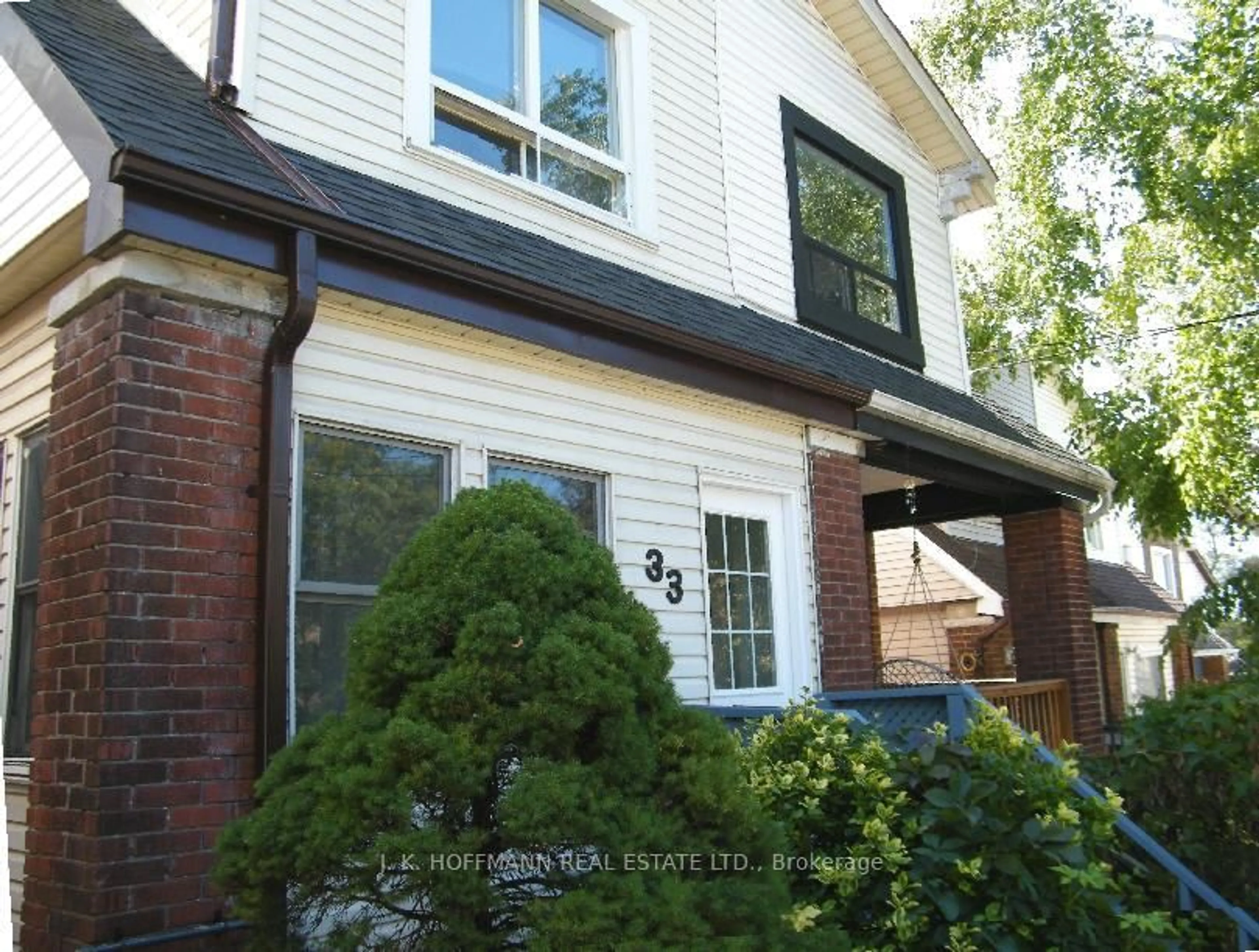 Home with brick exterior material, street for 33 Darrell Ave, Toronto Ontario M4E 2G5