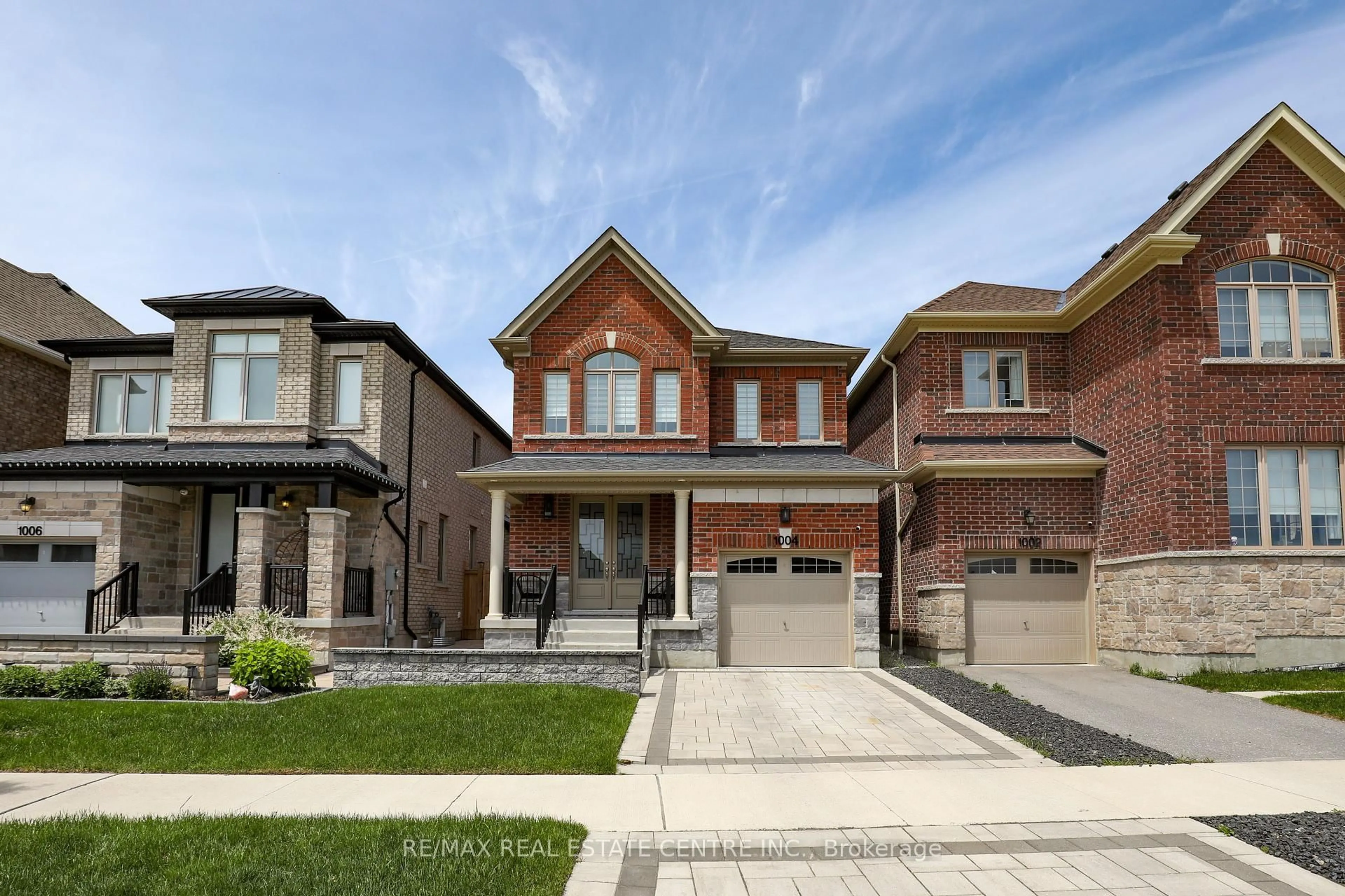 Home with brick exterior material, street for 1004 Kingpeak Cres, Pickering Ontario L1X 0H3