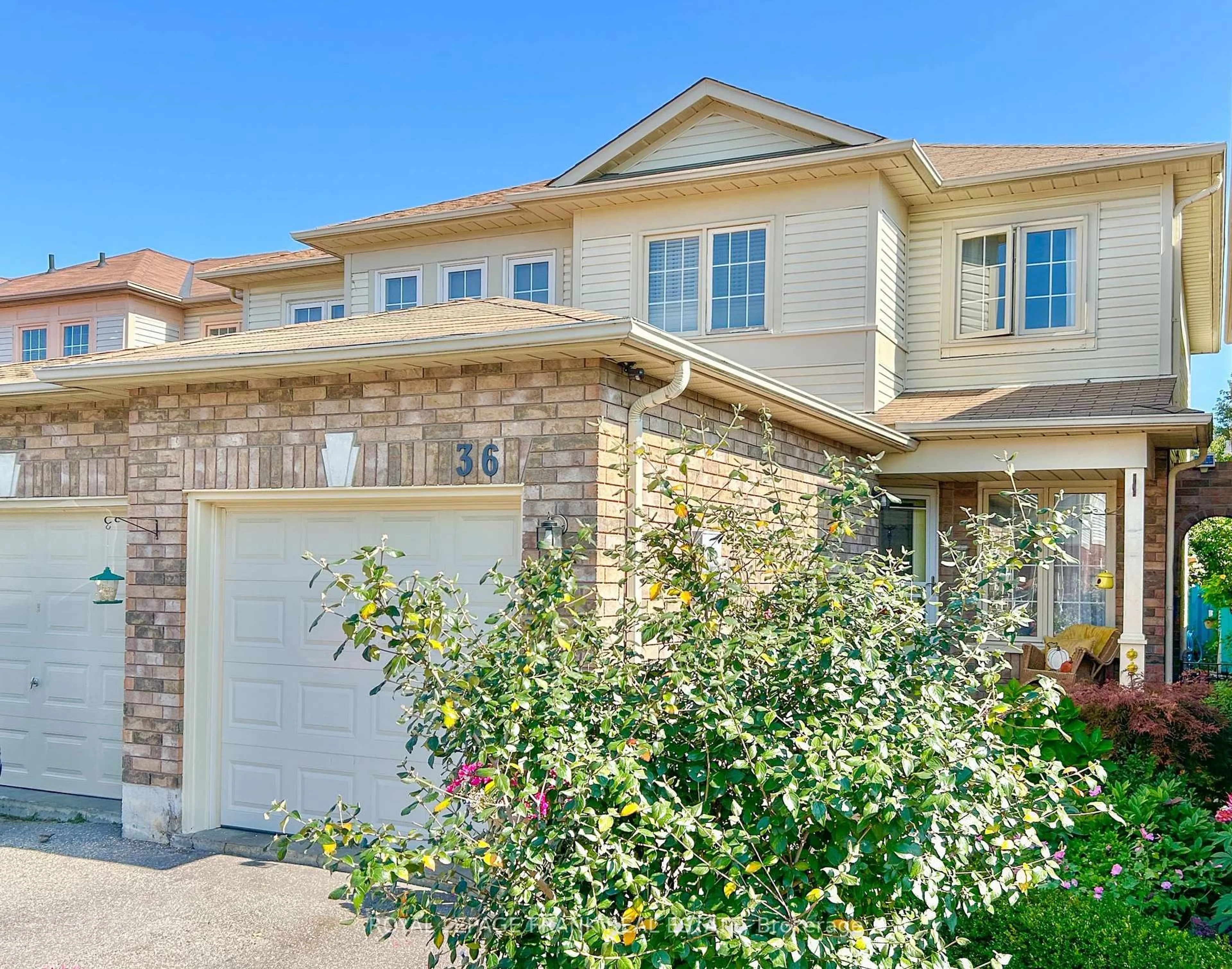 Home with brick exterior material, street for 36 Greengrove Way, Whitby Ontario L1R 2N4