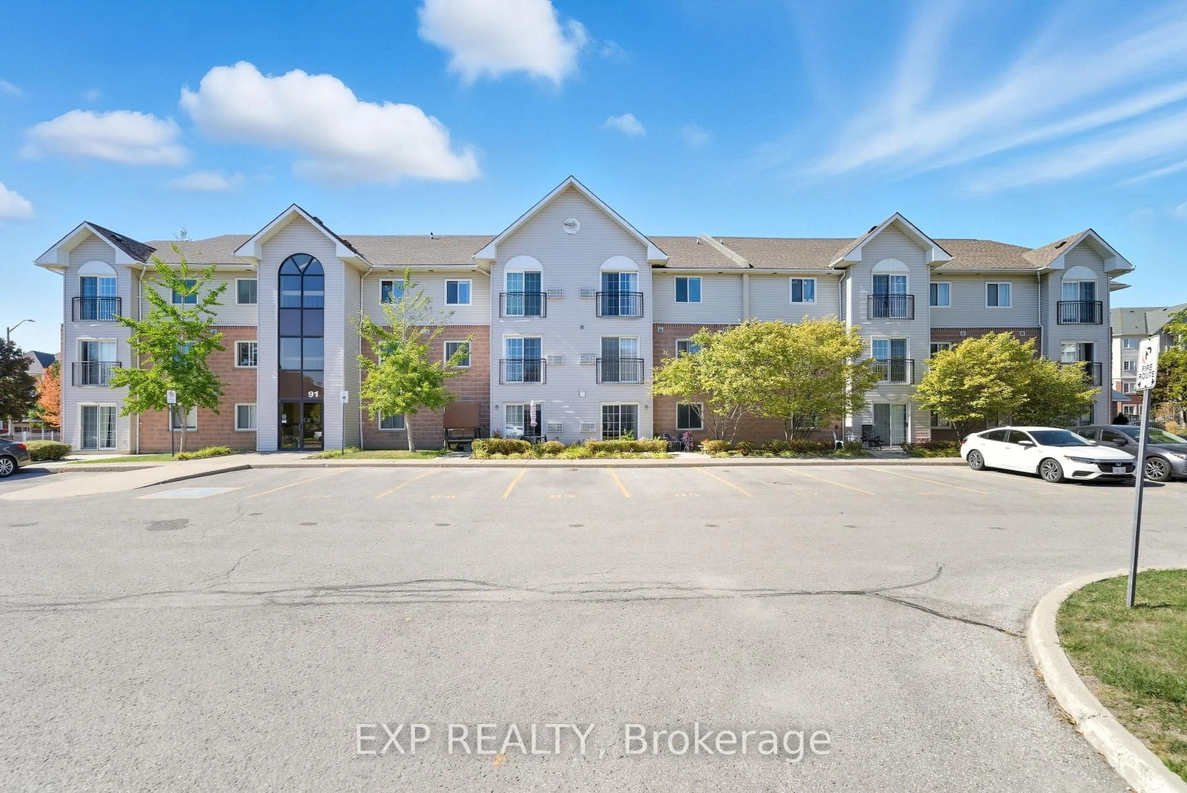 A pic from outside/outdoor area/front of a property/back of a property/a pic from drone, water/lake/river/ocean view for 91 Aspen Springs Dr #202, Clarington Ontario L1C 5J9
