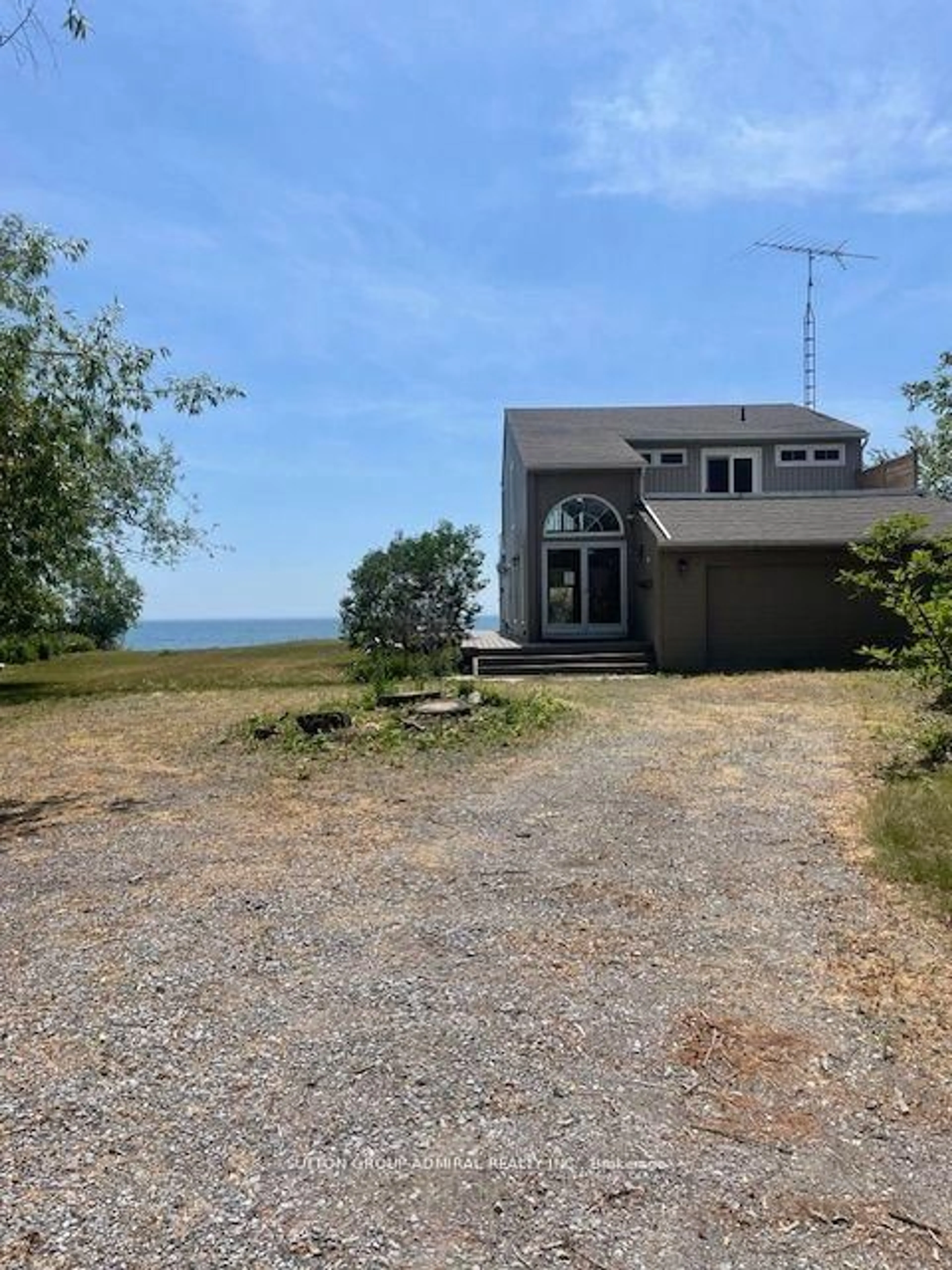 A pic from outside/outdoor area/front of a property/back of a property/a pic from drone, water/lake/river/ocean view for 151 Cedar Crest Beach Rd, Clarington Ontario L1C 5R2