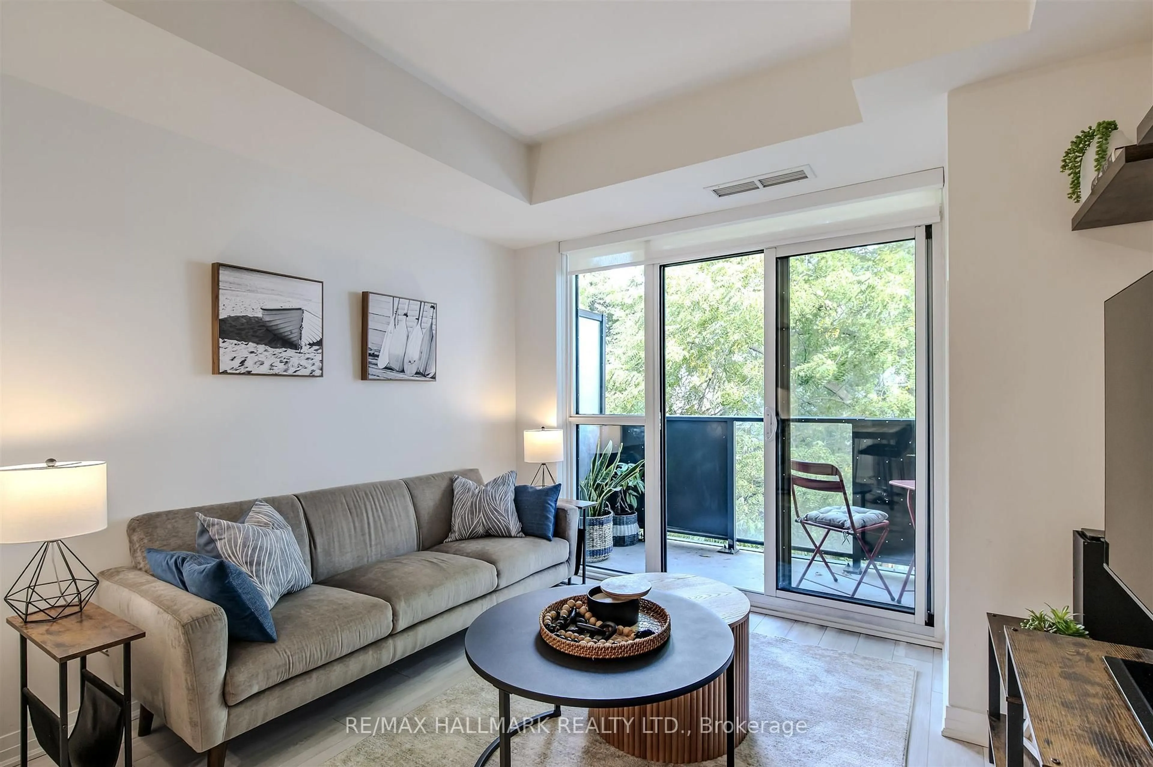 Living room with furniture, unknown for 1630 queen St #321, Toronto Ontario M4L 0B3