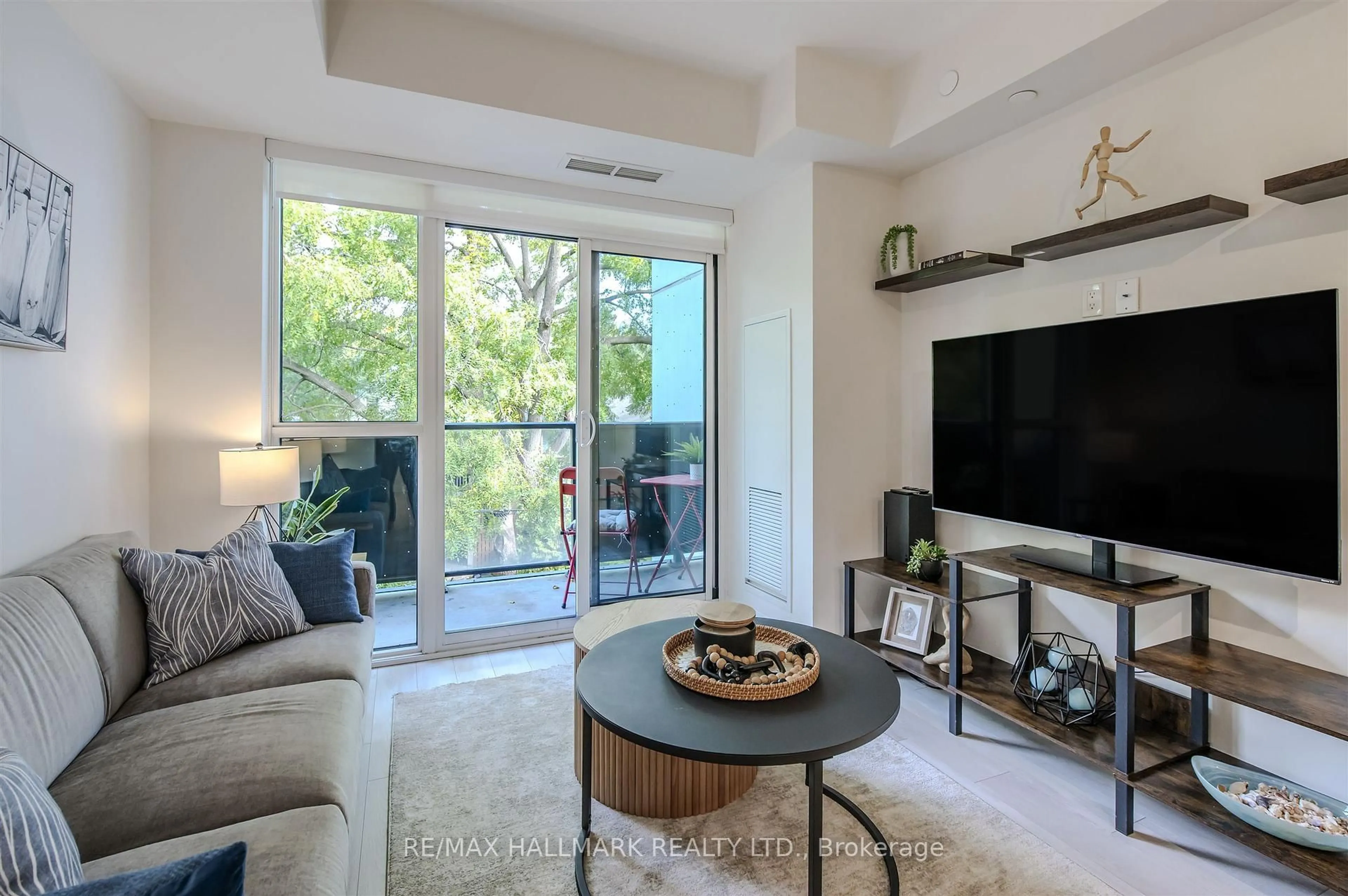 Living room with furniture, unknown for 1630 queen St #321, Toronto Ontario M4L 0B3