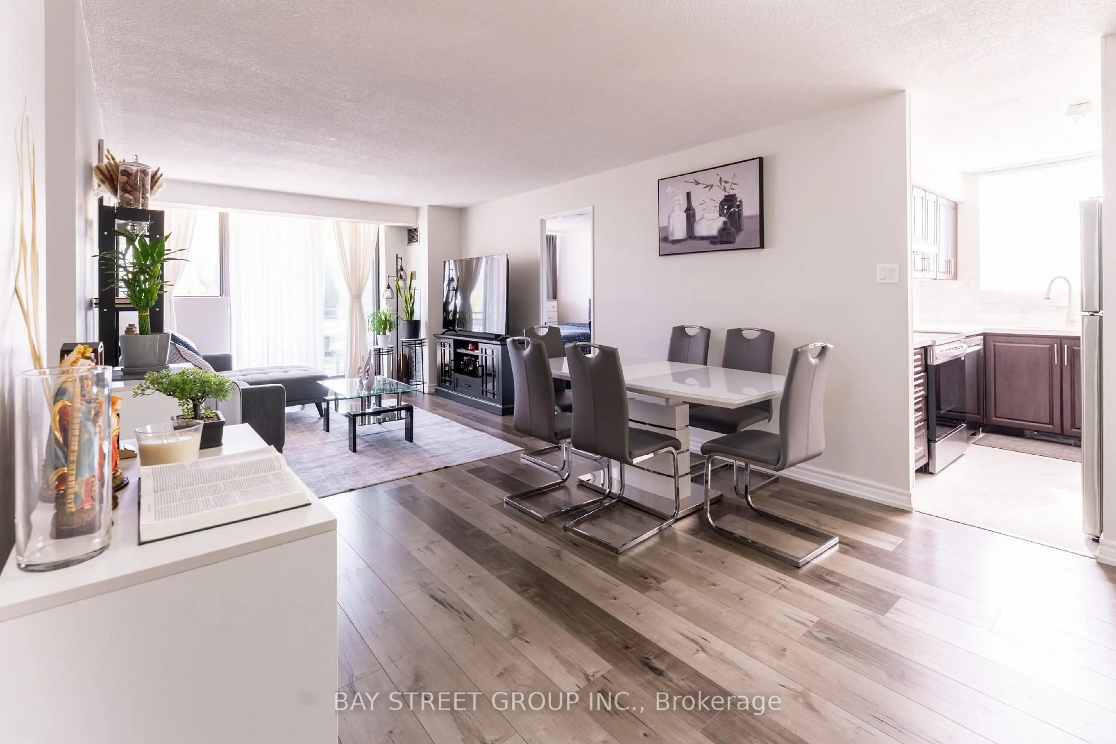 Living room with furniture, wood/laminate floor for 99 Blackwell Ave #211, Toronto Ontario M1B 3R5