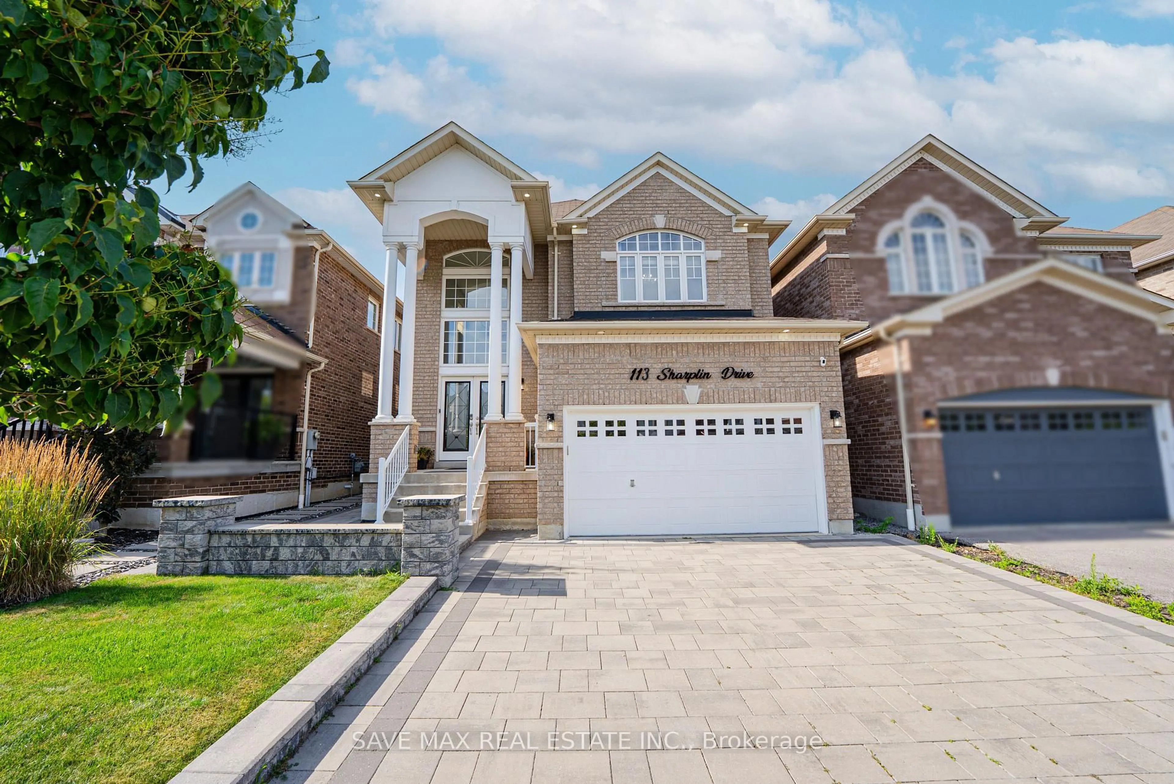 Home with brick exterior material, street for 113 Sharplin Dr, Ajax Ontario L1Z 0P3