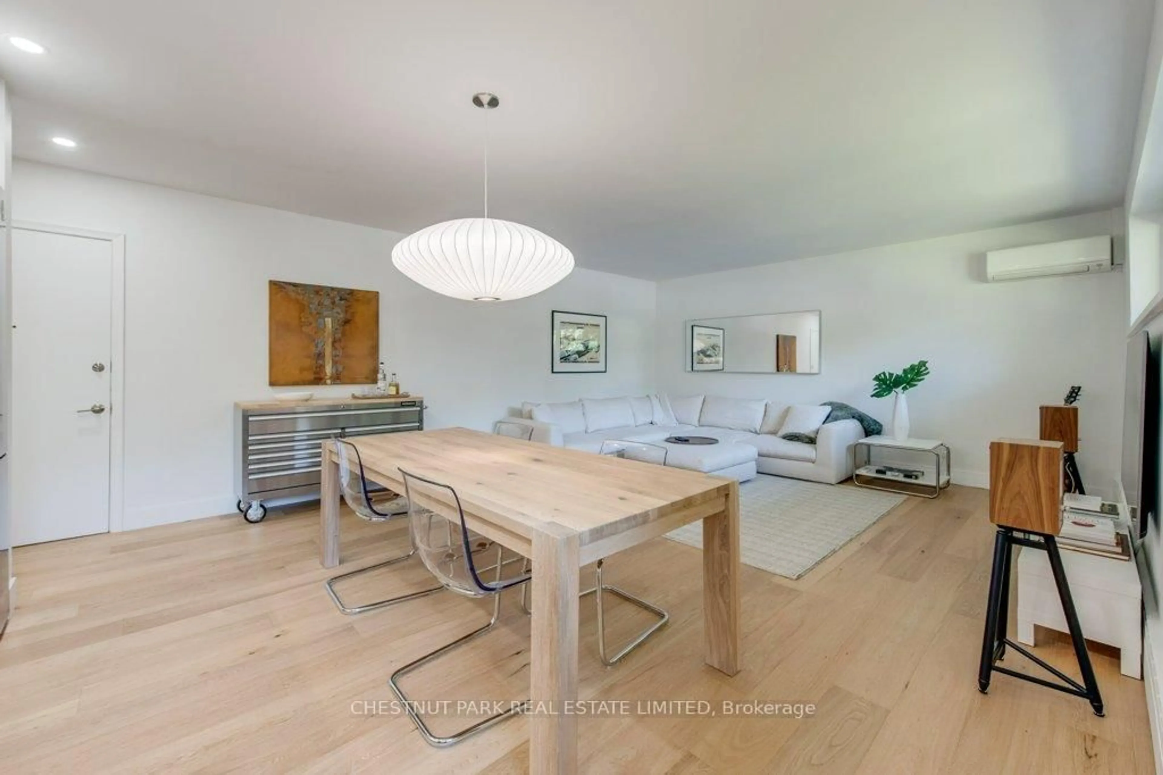 Dining room, wood/laminate floor for 75 Scarborough Rd #3, Toronto Ontario M4E 3M4