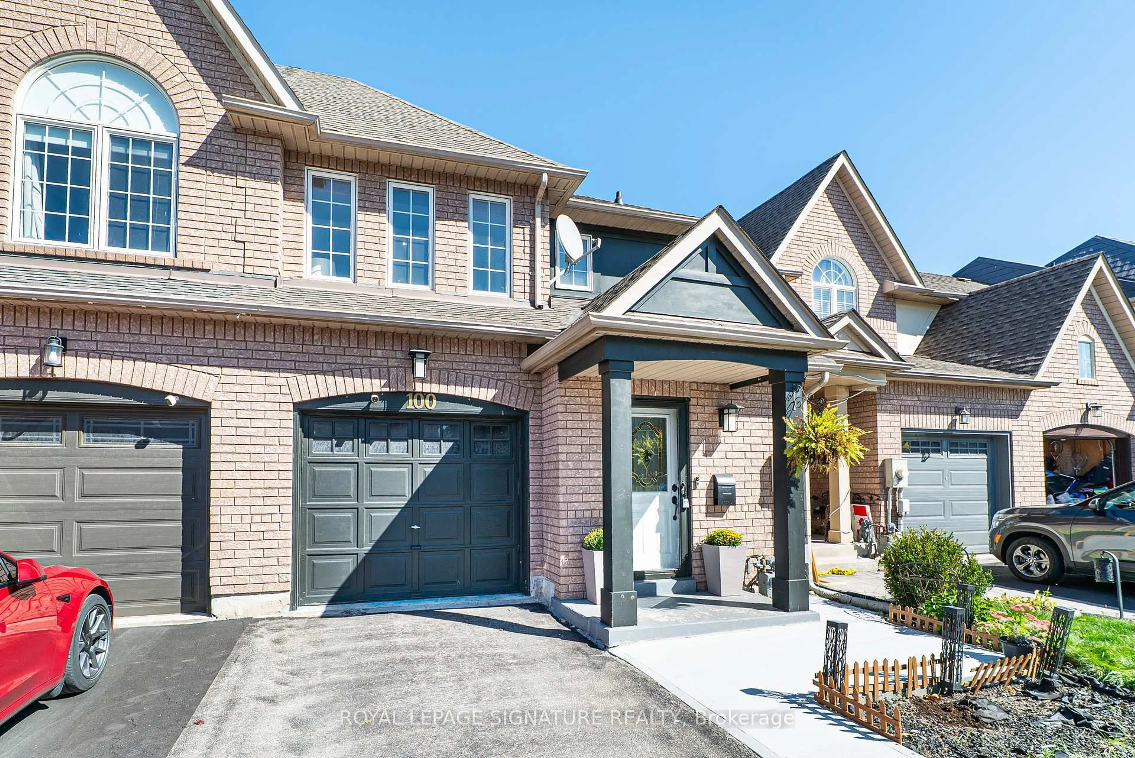 Home with brick exterior material, street for 100 Stokely Cres, Whitby Ontario L1N 9S9