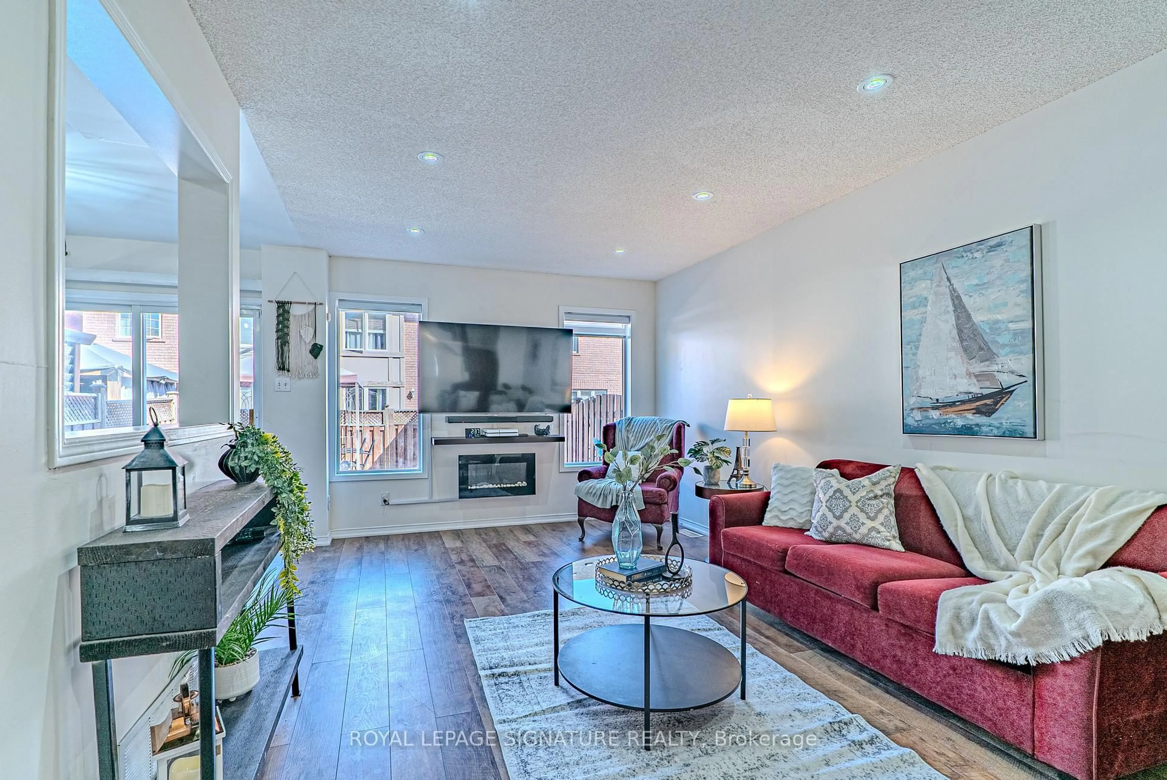 Living room with furniture, unknown for 100 Stokely Cres, Whitby Ontario L1N 9S9