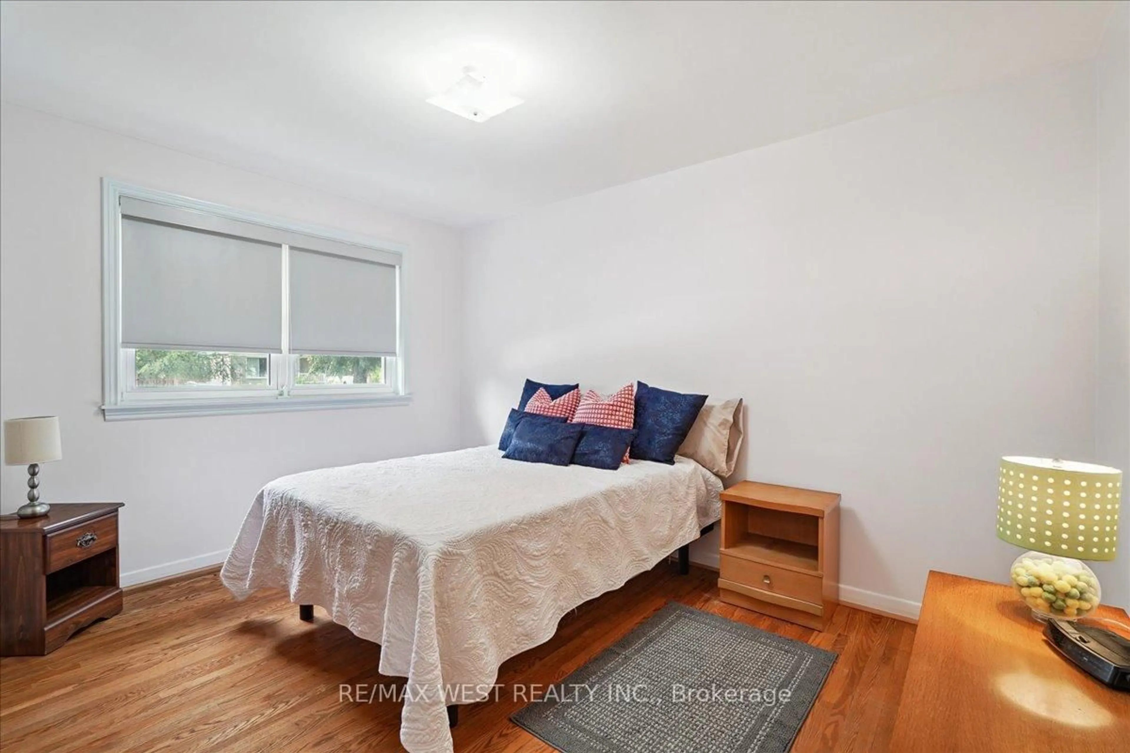 Bedroom with bed, wood/laminate floor for 195 Toynbee Tr, Toronto Ontario M1E 1G5