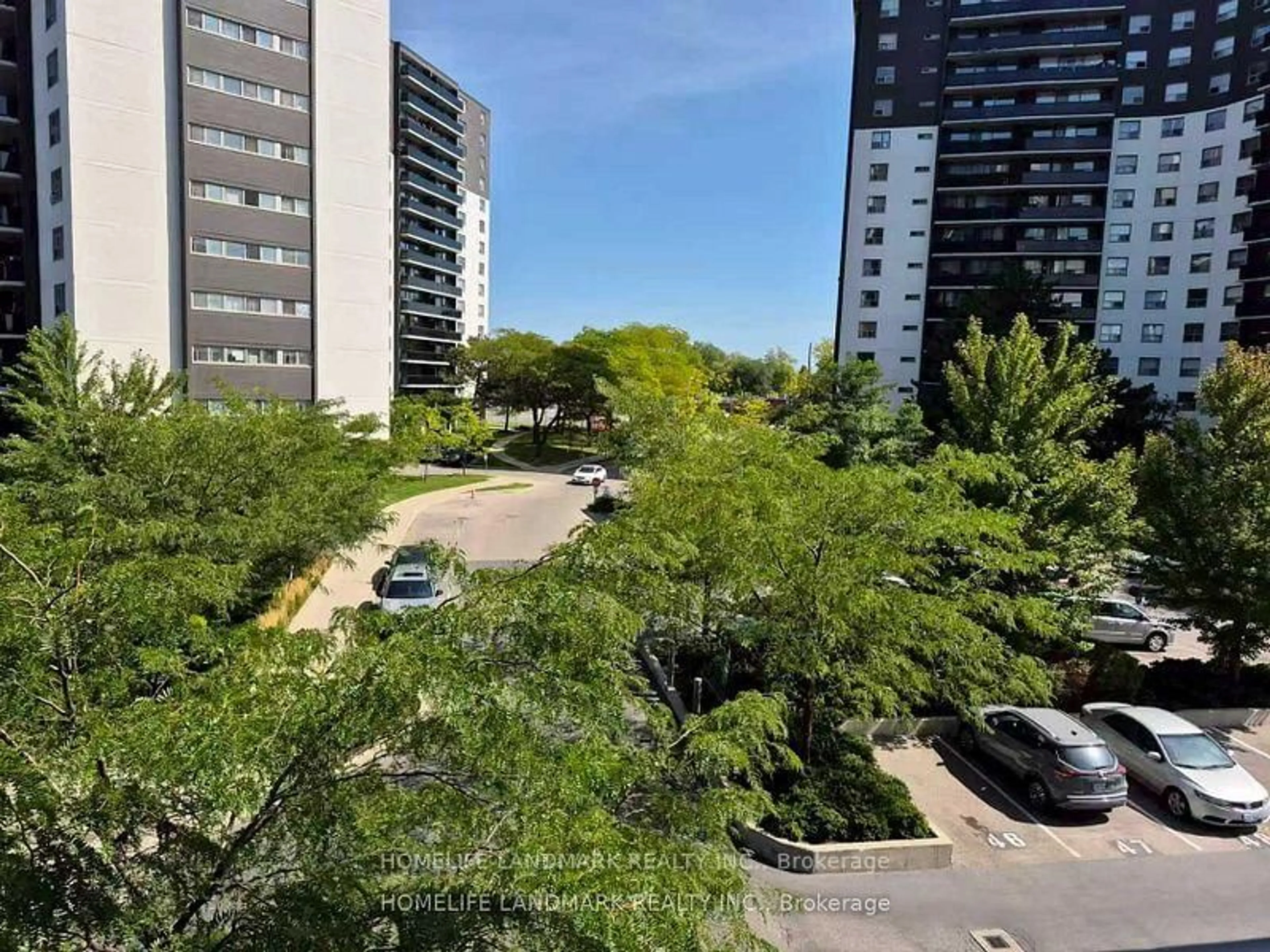 A pic from outside/outdoor area/front of a property/back of a property/a pic from drone, city buildings view from balcony for 1346 Danforth Rd #302, Toronto Ontario M1J 0A9