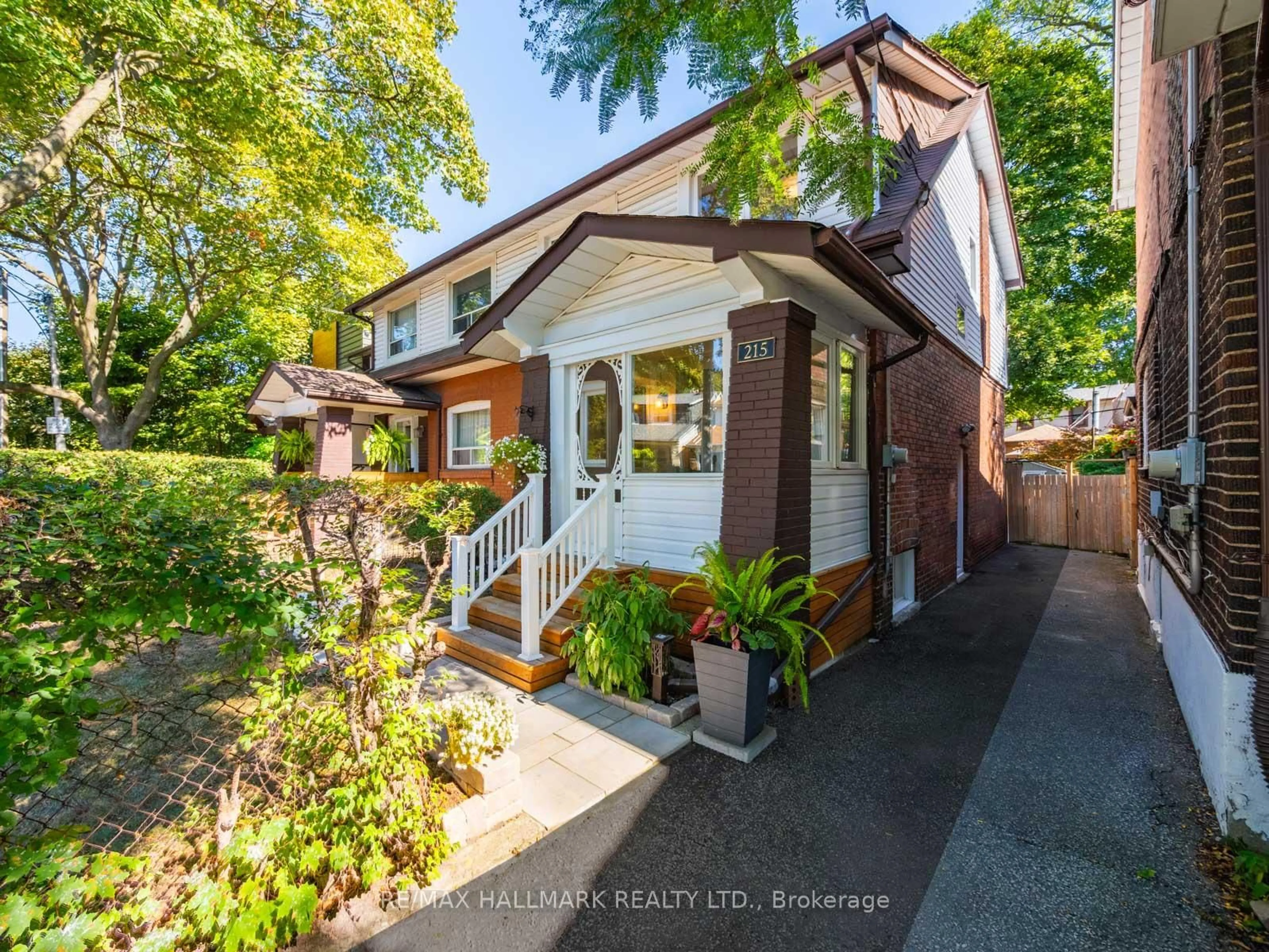 Home with brick exterior material, street for 215 Golfview Ave, Toronto Ontario M4E 2K8