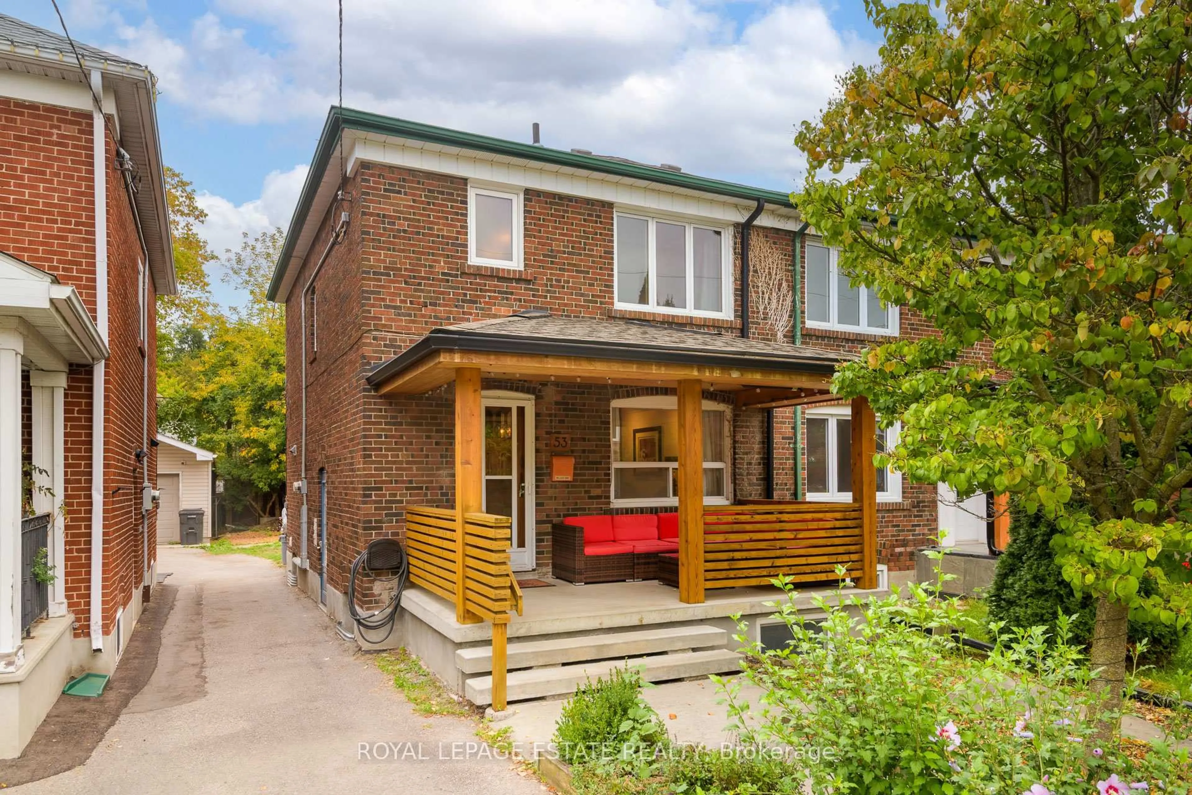 Home with brick exterior material, street for 53 Hertle Ave, Toronto Ontario M4L 2T3