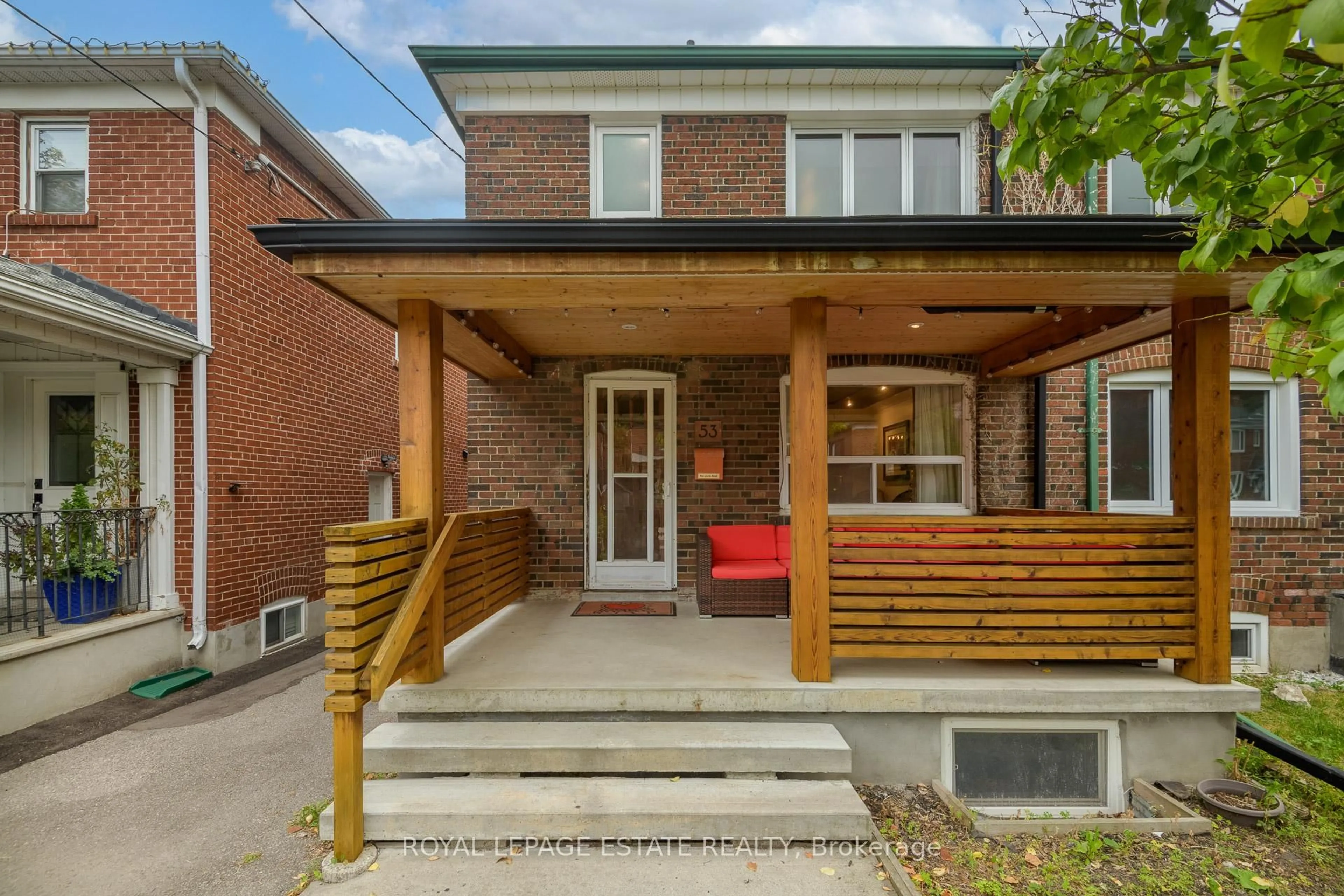 Home with brick exterior material, street for 53 Hertle Ave, Toronto Ontario M4L 2T3
