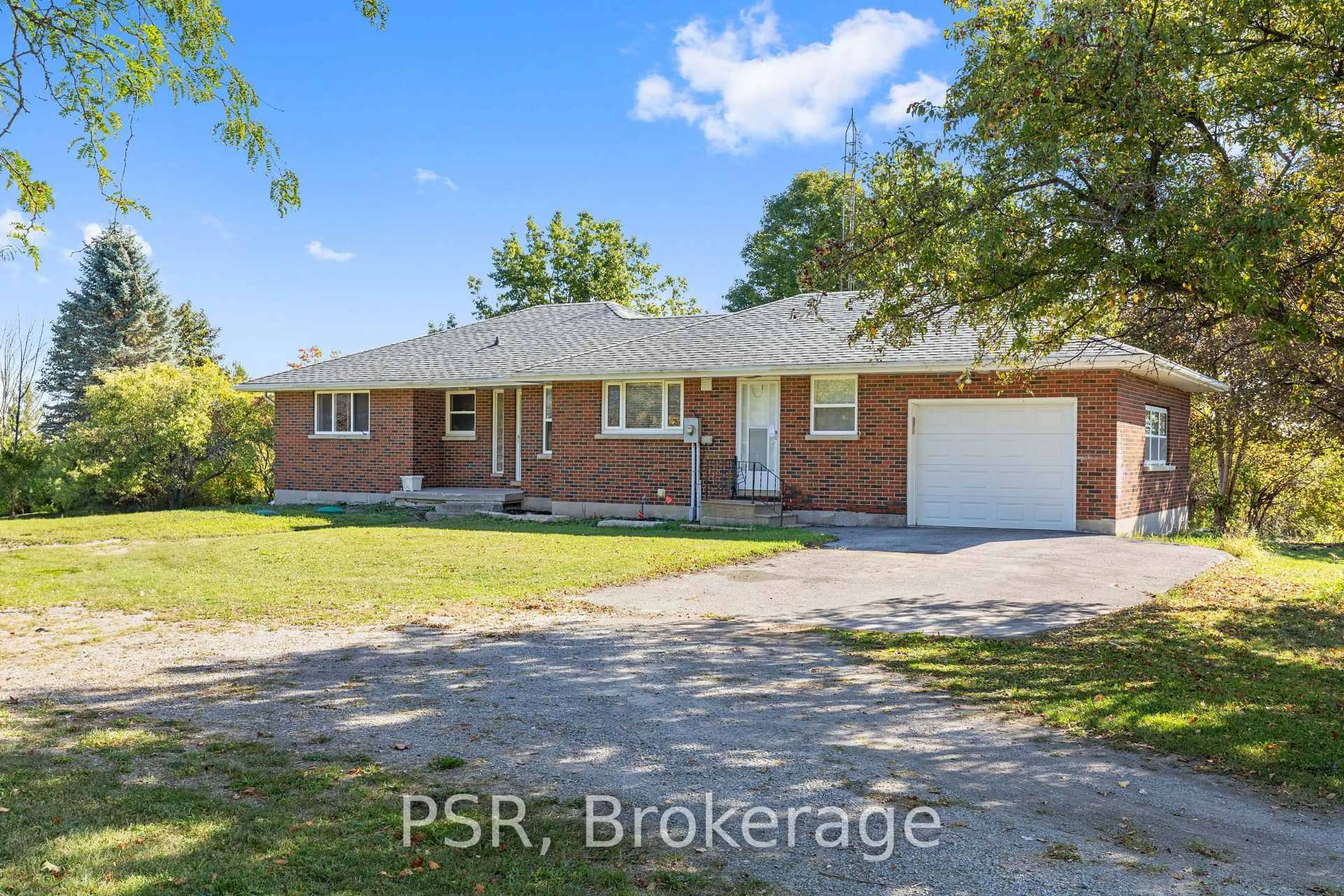 Home with brick exterior material, street for 1205 Scugog Line 10, Scugog Ontario L0C 1G0