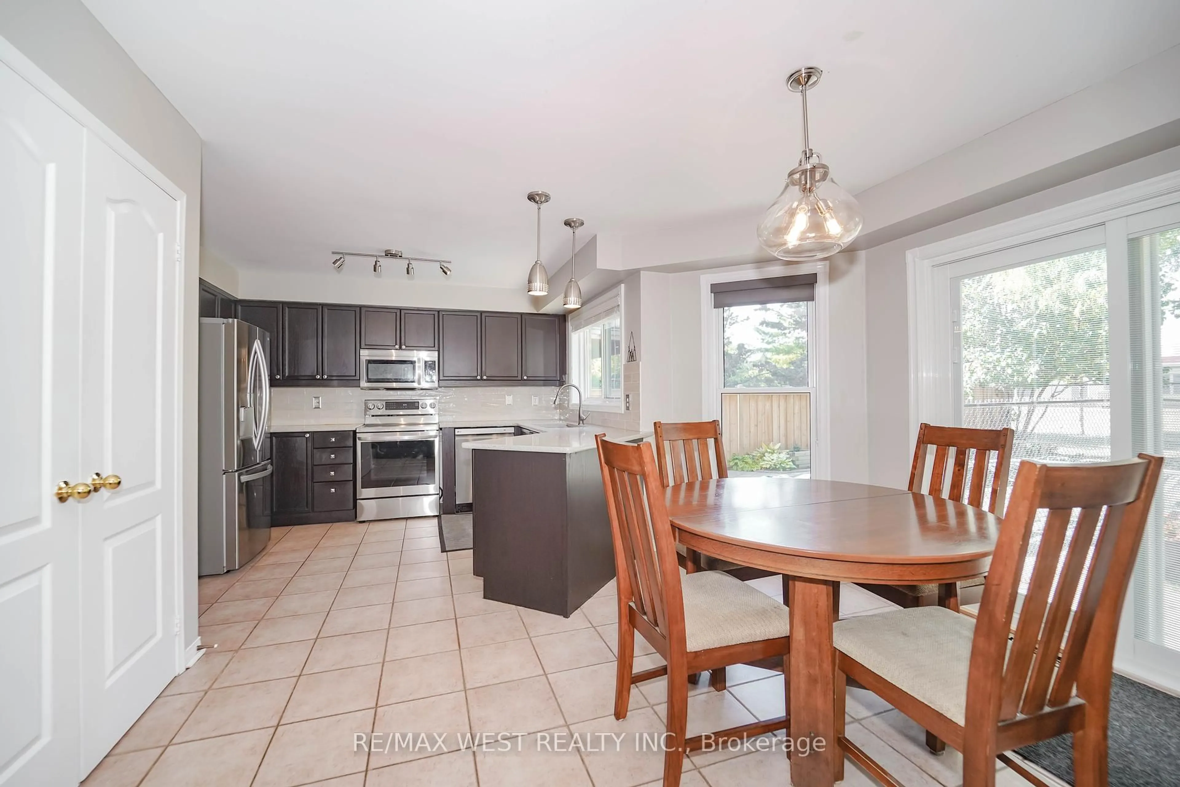 Open concept kitchen, ceramic/tile floor for 50 Gartshore Dr, Whitby Ontario L1P 1N6