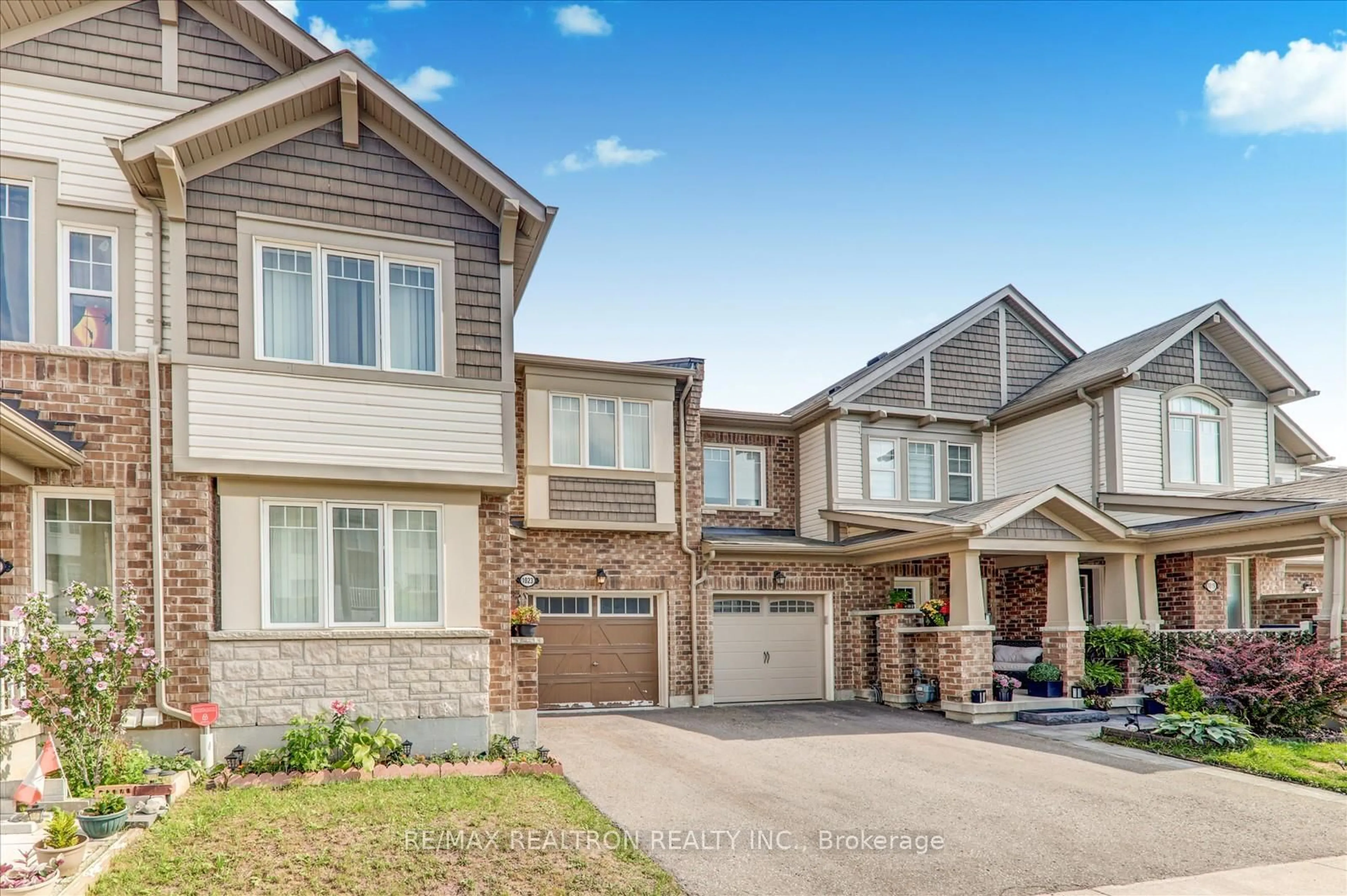 Home with brick exterior material, street for 1023 Dragonfly Ave, Pickering Ontario L1X 0E9