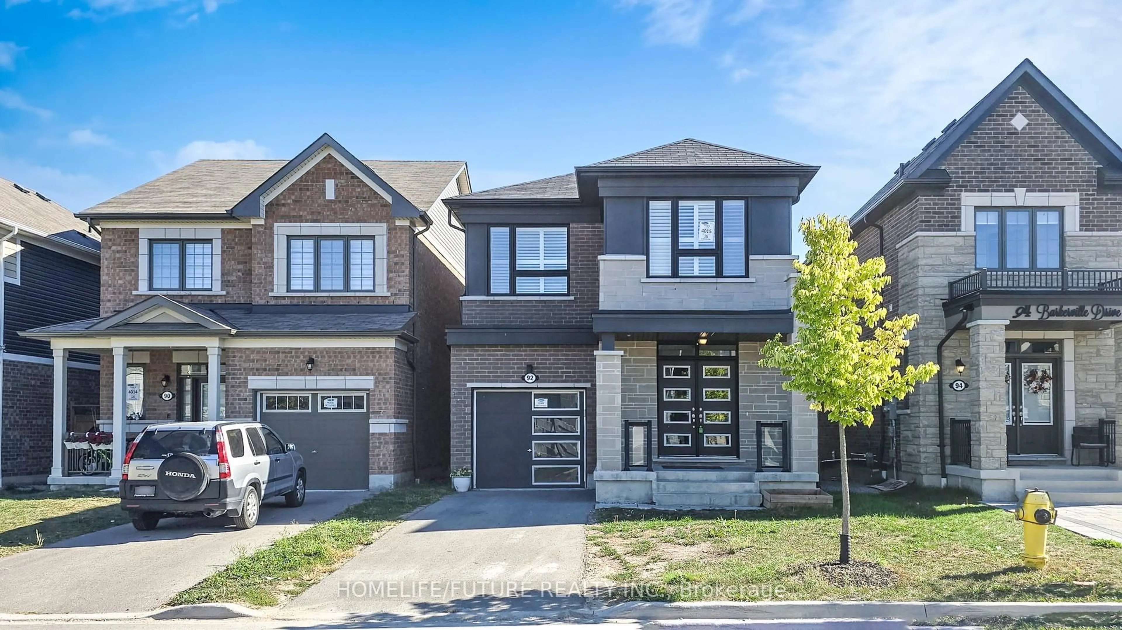 Home with brick exterior material, street for 92 Berkerville Dr, Whitby Ontario L1P 0L8