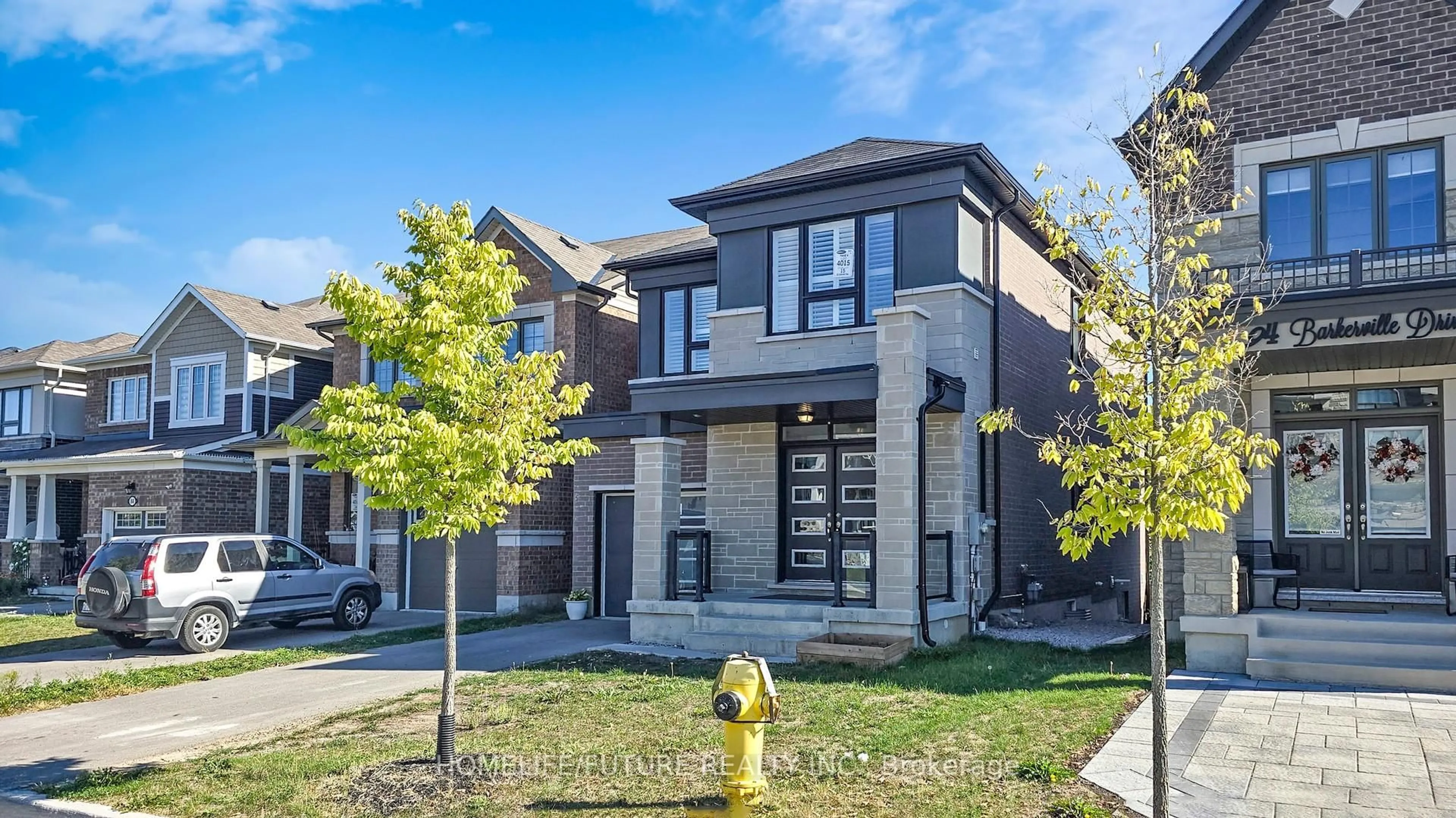 Home with brick exterior material, street for 92 Barkerville Dr, Whitby Ontario L1P 0L8