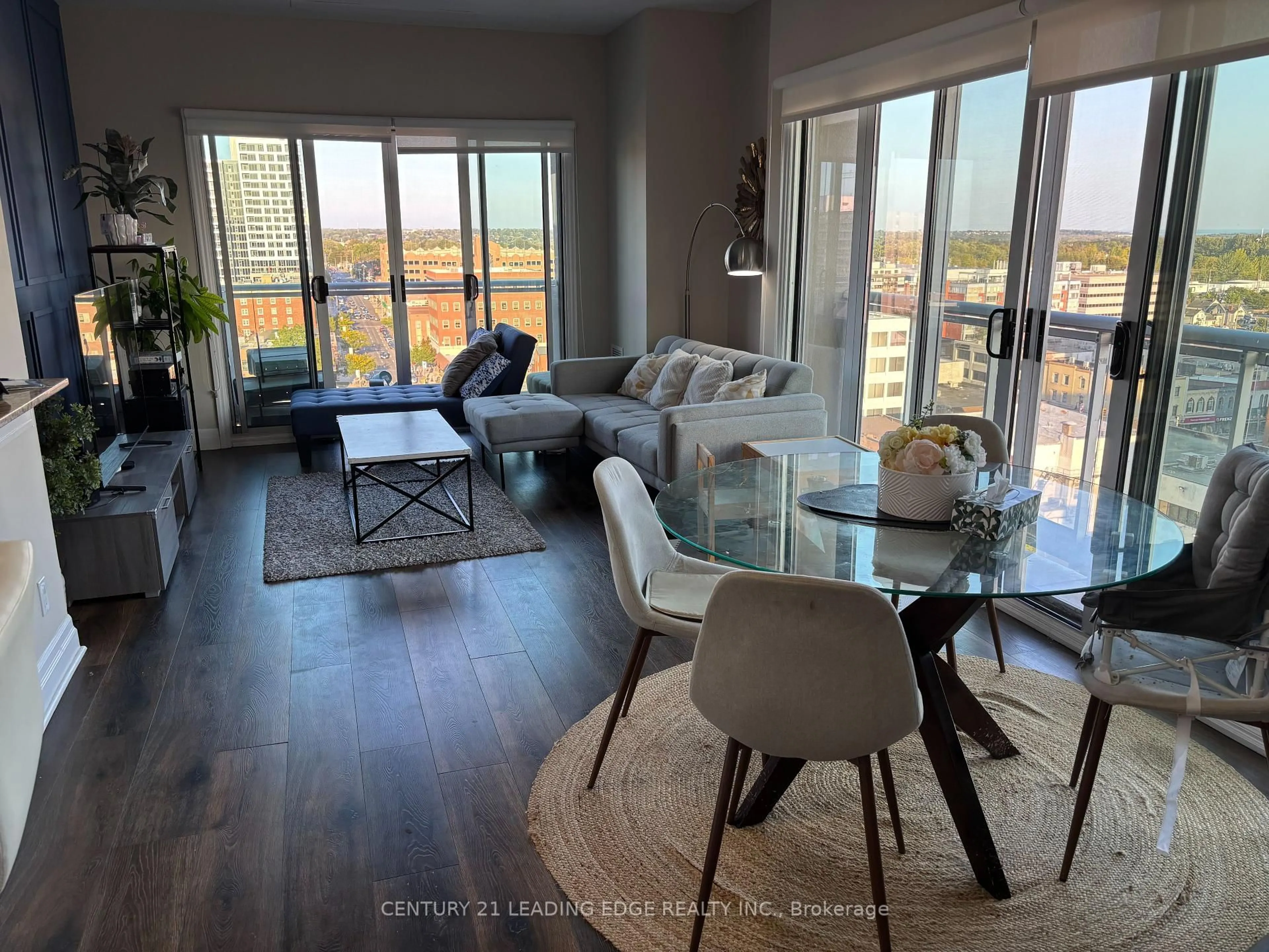 Living room with furniture, wood/laminate floor for 44 Bond St #1005, Oshawa Ontario L1G 6R2