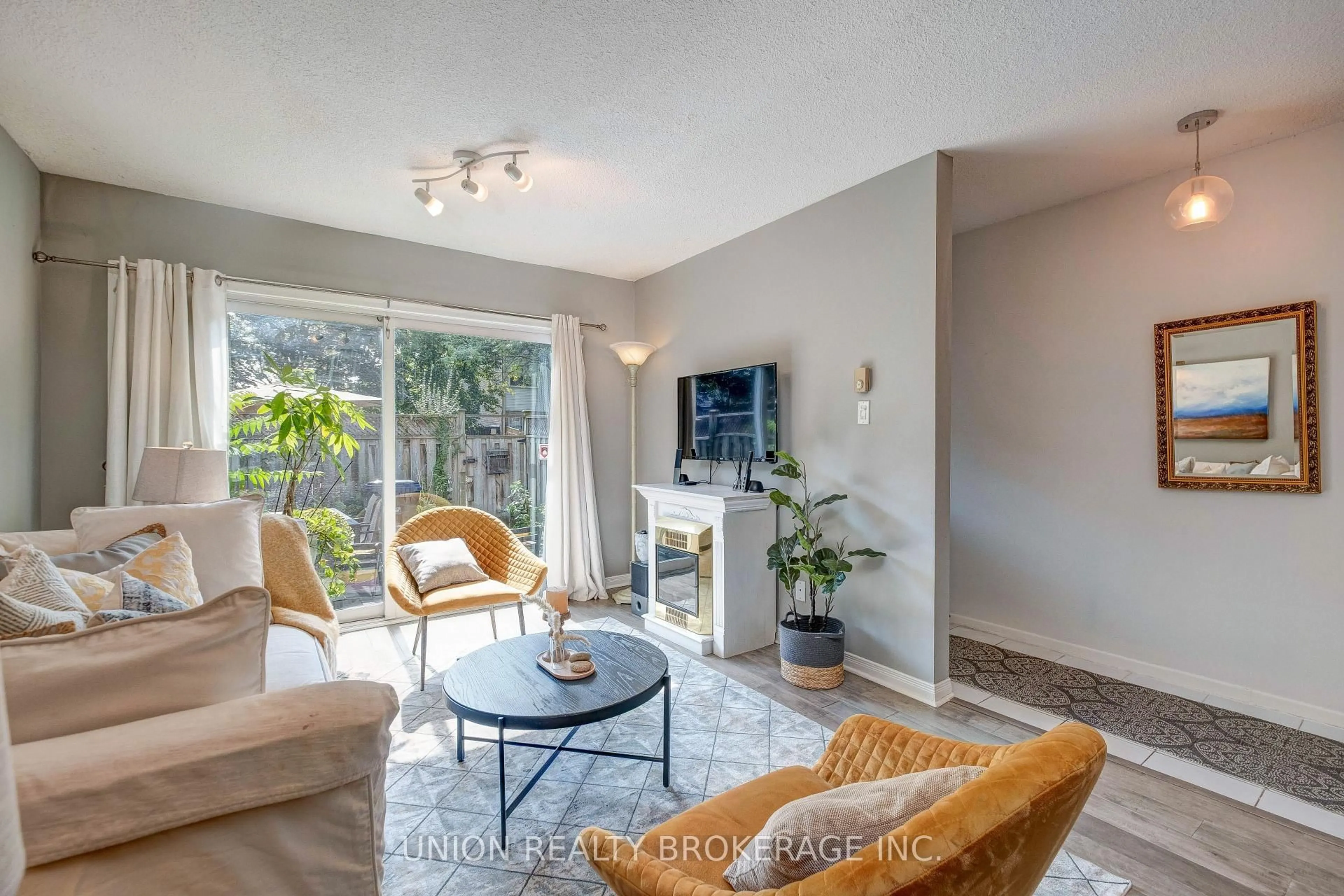 Living room with furniture, unknown for 50 Battenberg Ave #5, Toronto Ontario M4L 1J8