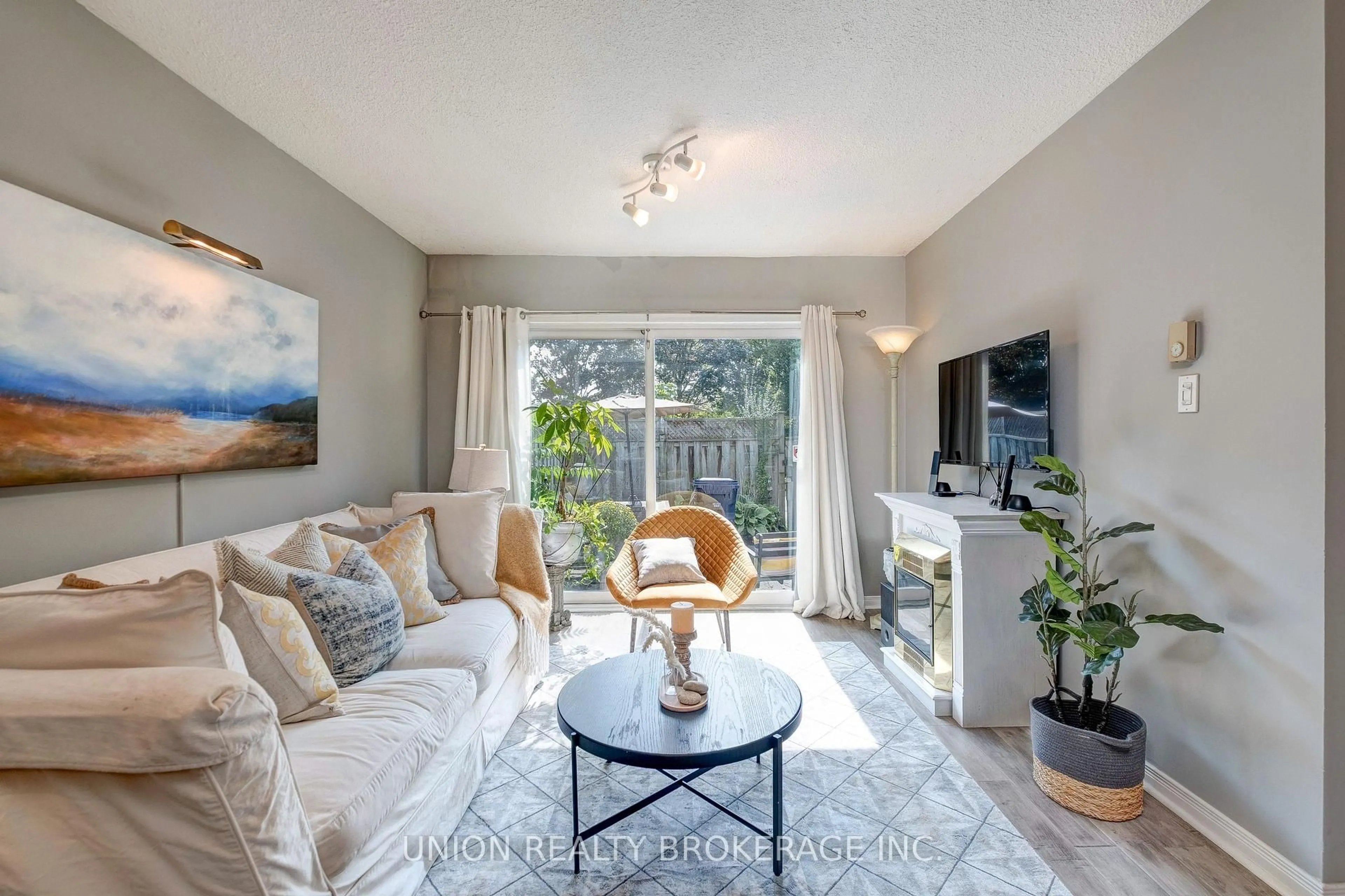 Living room with furniture, unknown for 50 Battenberg Ave #5, Toronto Ontario M4L 1J8